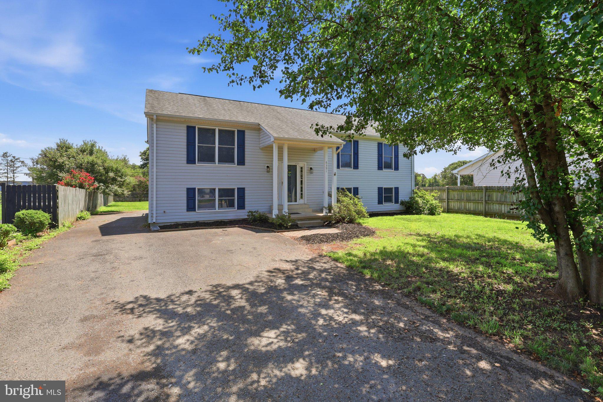 Situated at the end of a quiet cul de sac, this four bedroom, three bathroom home offers a massive, mostly fenced in backyard, large deck with new composite decking, new flooring on main level, TRANE HVAC, newer water heater, 7 year old roof, water softener, and full primary suite on lower level.  Additionally, Meadfield has no HOA!  True square footage is 2,480.  TLC and finishings are required; this is a chance to make it your own.