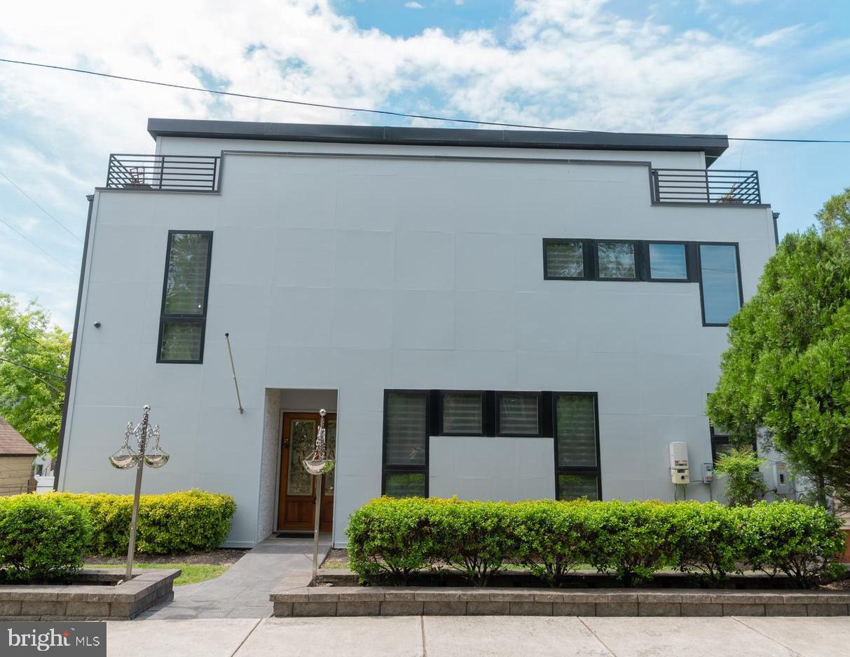 Located in the heart of Arlington, 900 20th St S is a rare opportunity to own a truly distinctive home that blends historic character with modern functionality. The original 1930s Sears home has been beautifully preserved, maintaining its charm and craftsmanship, while a thoughtfully designed 2019 addition seamlessly expands the living space. With over 6 bedrooms and 4.5 bathrooms, this home offers incredible flexibility—especially for large families, multi-generational living, or those in need of a private in-law or guest suite without sacrificing comfort or privacy.

What truly sets this property apart is how it lives. Multiple outdoor spaces—including a rooftop deck, welcoming front porch, expansive rear deck, and a private porch off the main suite—create a seamless indoor-outdoor lifestyle that’s hard to find this close to the city. The layout allows everyone to have their own space while still feeling connected, making it ideal for families who want room to grow, host, and entertain with ease.

Beyond the home itself, the location is exceptional. You’re just minutes from everything that makes Arlington so desirable—vibrant dining, shopping, parks, and easy access into Washington. With proximity to hubs like Pentagon City and Crystal City, plus major commuter routes and transit options, this is convenience at its highest level. Properties that offer this combination of character, scale, and location are incredibly rare—this is a home that not only stands out, but truly delivers.