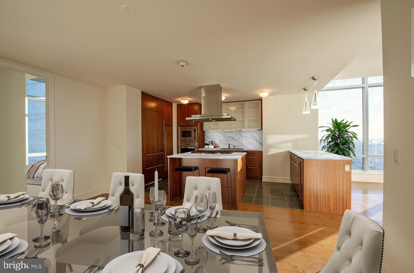 Experience unparalleled luxury and iconic views from this stunning 3-bedroom, 3.5-bath residence at The Ritz-Carlton Residences Philadelphia, one of the city’s most prestigious addresses. Located on the 45th floor, Residence 45G offers breathtaking southwestern views, including the iconic silhouette of Ben Franklin atop City Hall, all framed by soaring 11-foot ceilings unique to this level.

Designed with sophistication in mind, this residence features sleek hardwood floors in the living and dining areas and the third bedroom/office, while the primary and secondary bedrooms are appointed with plush carpeting and en-suite baths adorned in Calacatta and Crema Marfil marble. The chef’s kitchen is a showpiece, equipped with top-tier stainless steel appliances, including a Viking wall oven and microwave, paneled Sub-Zero refrigerator, Miele dishwasher, and Uline wine refrigerator.

Residents of The Ritz-Carlton enjoy world-class amenities that rival the finest hotels, including a chauffeur-driven Mercedes S-Class, a state-of-the-art fitness center, an indoor pool with locker rooms, a yoga room, a media screening room, and a resident lounge with WiFi. Outdoor spaces include dog runs and an enclosed park with a tranquil waterfall feature. A new wraparound terrace is coming soon, complete with lounge seating, fire pits, and an outdoor kitchen.

Additional perks include private resident-only access to the adjacent Ritz-Carlton Hotel, offering discounted rates for dining, spa services, and accommodations.

Currently tenant-occupied until June 30, 2024, this exceptional residence offers an unparalleled lifestyle of sophistication, convenience, and elegance. Don’t miss the opportunity to make one of Philadelphia’s finest residences your own.