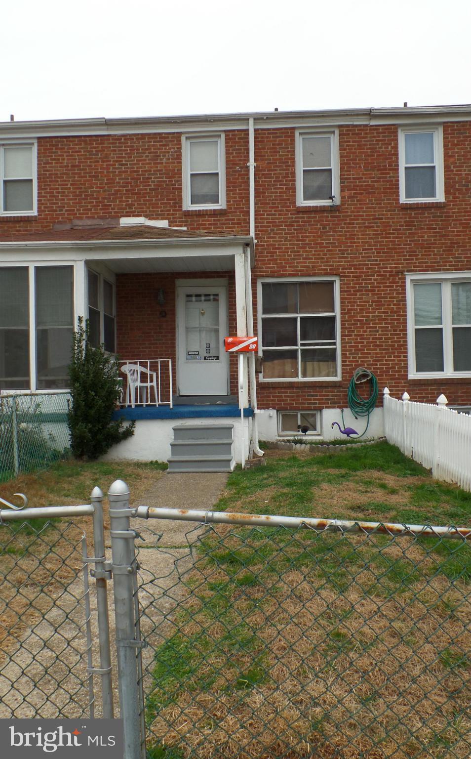 Investor alert! Easy rehab. 3BR/ 1BA porch front brick row home with central air in North Point Village. Off street parking pad, fenced yard. Convenient to 695, 95, shopping, health care, and community park nearby.  Cash only.  Home needs some work. Sold As-Is and is priced to sell!