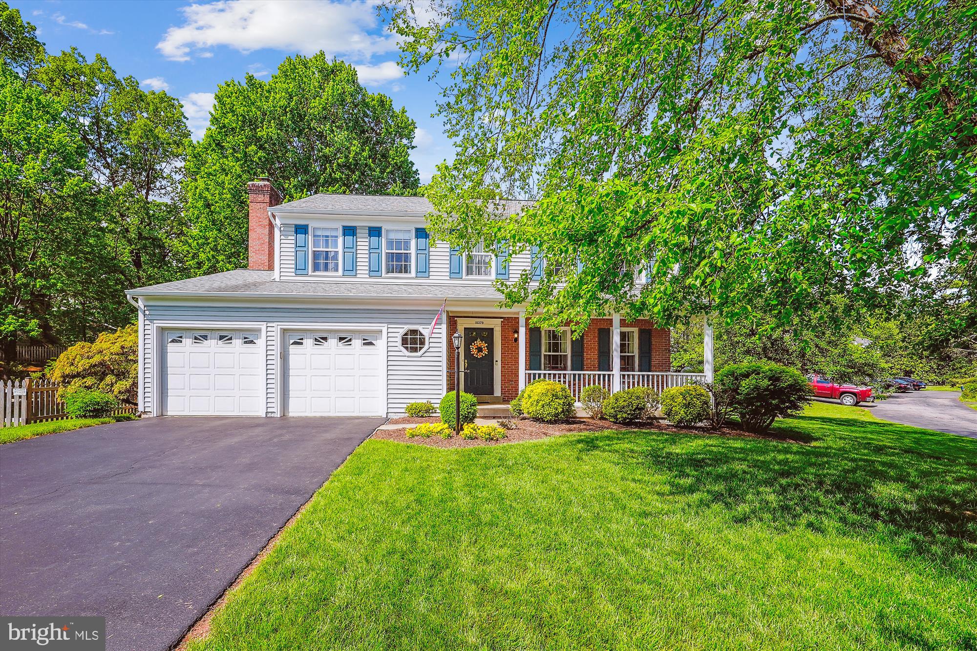 Pride of ownership shines throughout this meticulously maintained home, cared for by the original owners. Situated on a generous lot, this property features an oversized front and fenced backyard, plus an expansive rear hardscape that's perfect for outdoor entertaining or relaxing evenings. Step inside to find classic details like chair rail and crown molding, a wood-burning fireplace, and bright, welcoming living spaces. The large front porch invites you to sit and enjoy quiet mornings, while the spacious driveway easily fits six vehicles—ideal for gatherings or multiple drivers. Major updates have already been done, including a new dual fuel high-efficiency HVAC system and a newer roof, giving you peace of mind and energy efficiency. Located just minutes from the 234 Bypass, I-66 and the VRE station, this home offers both convenience and comfort in a well-established neighborhood. This is a rare opportunity to own a home that blends charm, space, and smart updates—schedule your tour today!
