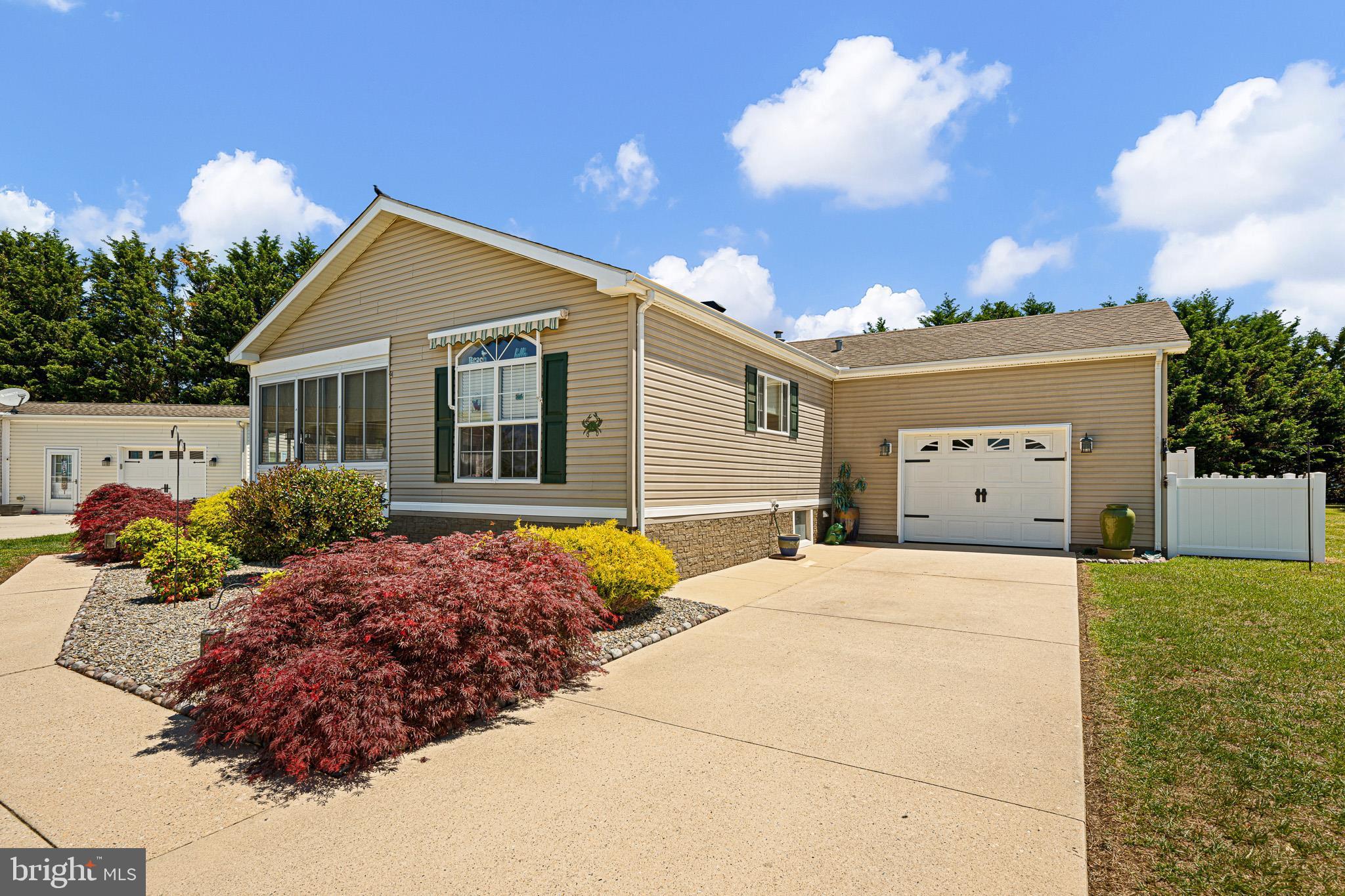 Tucked away in a highly coveted 55+ senior community, this immaculate, extensively remodeled, and thoughtfully upgraded residence stands as an idyllic choice for either a primary home or a serene beach escape. The sleek kitchen, inviting living space creates a warm environment for both relaxed daily living and gracious entertaining.A detailed list of enhancements - too numerous to fully enumerate here, makes for a great deal, reveals the meticulous care and quality poured into this home, making it a true standout, a radiant jewel within its vibrant surroundings with a natural privacy screen between the back yard and the rear neighborhood. The community itself elevates the lifestyle with exceptional amenities, including a luxurious heated indoor pool, a welcoming clubhouse, a charming dog park, and more.Just a short jaunt away lie Delaware's renowned tax-free outlet shopping, pristine beaches, scenic parks, eclectic boutiques, and world-class dining, blending convenience and leisure into an unparalleled living experience.