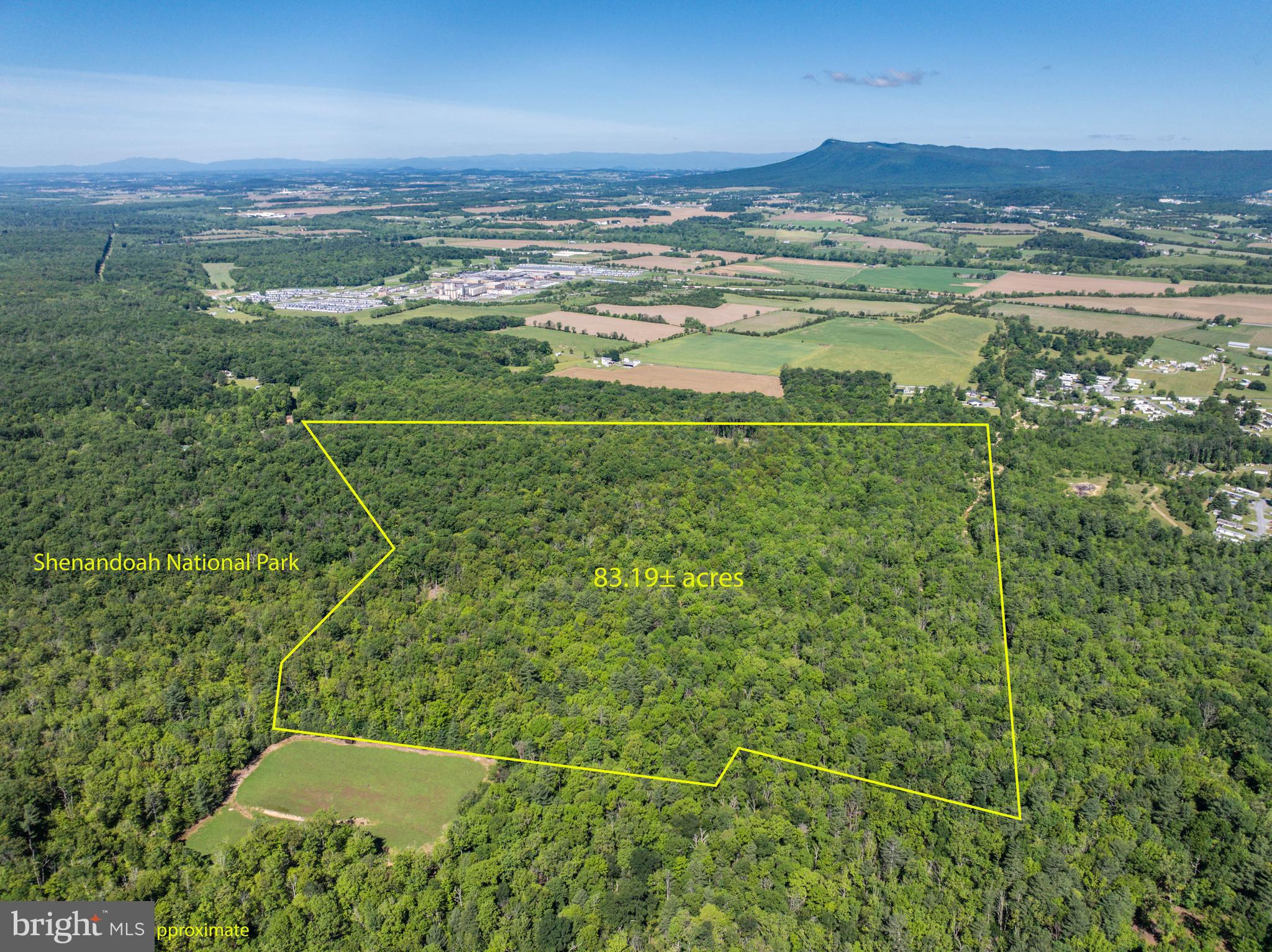 Rare opportunity to own a premier hunting and recreational property just minutes south of Elkton with nearly 2000' of shared boundary with Shenandoah National Park! Strictly managed for trophy-class whitetail deer over the last seven years, this exceptional tract is ideally positioned between Shenandoah National Park and surrounding agricultural fields, creating a prime travel corridor for mature bucks moving from bedding to forage habitat. Accessed through a gated entrance via a 20' wide deeded right-of-way off of Berrytown Road, the property offers both privacy and convenience. A deep, clear creek-fed pond provides an excellent year-round water source for wildlife and ideal habitat for wood ducks. The area surrounding the existing workshop has been thoughtfully timbered to enhance wildlife habitat and replanted with apple and pear trees to further attract and sustain game populations. Buried electricity is already in place at the workshop, which sits at an ideal homesite location. A 5-bedroom conventional septic certification letter and well construction permit is on record with the Health Department, providing an excellent opportunity to build a primary residence, weekend retreat, or hunting lodge. Zoned A2, this property combines outstanding hunting potential with the ability to create a private mountain getaway bordering one of Virginia's most sought-after natural areas. No HOA and no covenants to deal with either! Only a short drive from the recreation offered by Massanutten Resort and all the amenities of Harrisonburg.