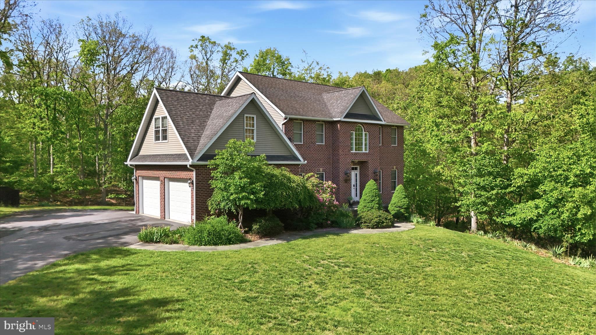 This 4 bedroom, 2.5 bath home on a beautiful .89 acre lot in Lakewood is just waiting for you to call it your home and add your personal style! The lot is magnificent, the floor plan is spot on, the room sizes are all generous, the unfinished basement is perfect for just your needs, the 2 story foyer is grand, the kitchen is large enough for family to gather! What are you waiting for? Come take a look at this colonial that backs to woods, has 2 walk-in closets in primary suite w/ garden tub, PLUS all that Lakewood has to offer. Low, WV property taxes, convenient commute to work, a shared  community area on South Lakewood Dr. w/  a private beach for Lakewood community residents only featuring  access to the lake, a  pavilion, playground, restrooms and a dock for fishing! What a way to enjoy your summer! NOTE: SELLER MUST FIND SUITABLE HOUSING.