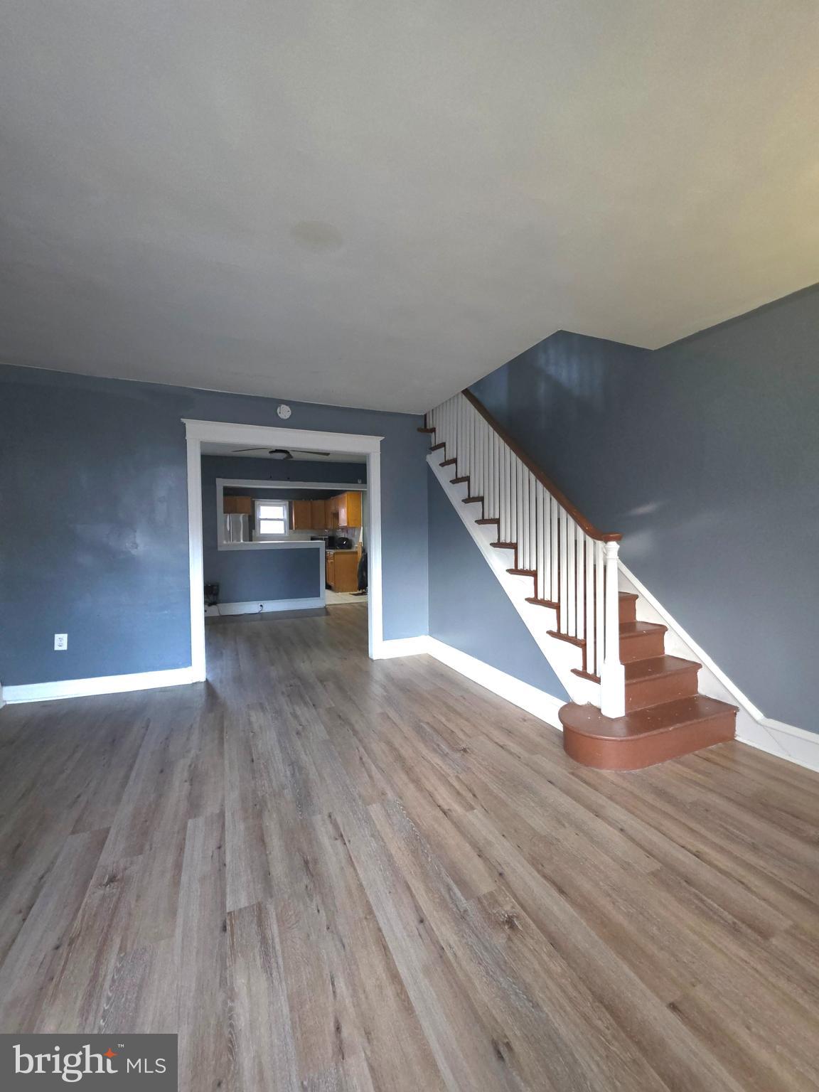 Very Motivated Seller!  Welcome to this well‑maintained home offering 3 spacious bedrooms and 2 full bathrooms, designed for comfort and flexibility. The property features a fully finished lower‑level suite, complete with its own full kitchen, making it ideal for extended family, guests, or private living quarters. Enjoy outdoor relaxation on the front porch, and take advantage of the driveway parking, a valuable convenience in the area. This home provides a functional layout with generous living space and multiple options for modern living. Move‑in ready and full of potential, this property is perfect for buyers seeking space and comfort. Buyer may qualify for up to $28,000 in grant assistance.