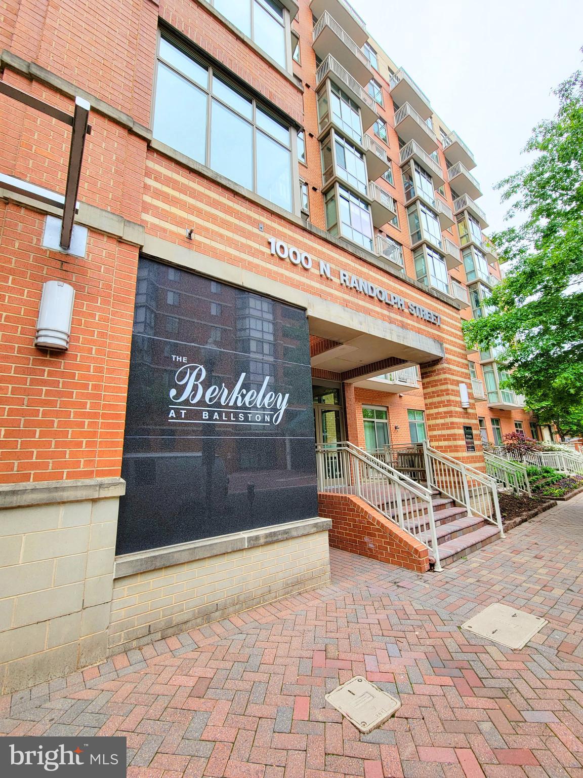 PRICE BELOW COMPARABLE AND TAX ASSESMENT.  Welcome to this stylish apartment in a boutique condominium building, built in 2004. Selected units offer a balcony with panoramic city views. The Berkeley has exceptional pedestrian activity all in the heart of Ballston.  Enjoy the luxury of this unit featuring a two primary suites, a den or office, a gourmet kitchen, floor to ceiling windows, assigned parking space and a storage unit. This residence boasts high ceilings with 1,325 square feet of elegant contemporary living space to entertain family and friends, work from home, and live comfortably.  The floor to ceiling windows fills with natural light the open concept designed of this apartment. The popular split bedroom floor plan provides ultimate privacy for its new owners. The primary suite has two walk-in closets and en-suite full-bathroom with a granite dual vanities, a soaking tub and remodeled tall shower. The secondary bedroom also has a walk-in closet and a hallway full bathroom. The custom gas fireplace warms the new hardwood floors adding further sophistication. The den and living spaces have new hardwoods and have been recently painted. To complete this amazing home, we have an in-unit side by side front load washer and dryer and extra storage shelving. The Berkeley is a 9-story boutique condominium offering a courtyard, fitness center, a well-appointed lobby and concierge service and located just across the street from Ballston Metro, one of Marymount’s university buildings, a variety of shops such as Ballston Quarter mall, restaurants and parks, the Berkeley is a walker’s paradise!!