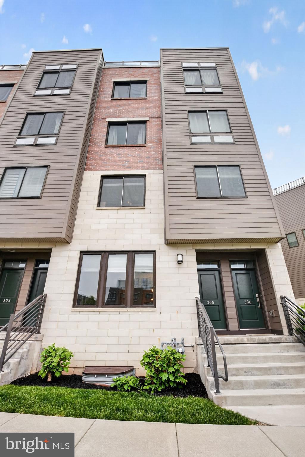 Exceptional real estate opportunities are defined by their surroundings, and this rare end unit within the Brownstones at Lakeview Court offers a premier position that is difficult to replicate. This home was constructed in 2020 and maintains the pristine quality of newer construction throughout the entire floor plan. Situated on a premium lot with serene views of a pond, the property invites a sense of tranquility rarely found so close to the vibrant King of Prussia Town Center. The front of the home provides a peaceful setting and an incredible view through a triple window in the main living area. Natural light fills the open-concept main level featuring wide plank flooring which seamlessly integrates the spacious living room, dining area, and kitchen. The gourmet kitchen serves as a sophisticated focal point, featuring high-end cabinetry with soft-close drawers, premium stainless steel KitchenAid appliances, quartz counters, and a subway tile backsplash. A large sink is set into the center island, which includes pendant lighting and seating for two. The entrance to the attached garage is conveniently located directly off the kitchen to allow for easy transport of groceries and supplies. The upper level contains a bright primary suite distinguished by a tray ceiling with recessed lighting, a ceiling fan, and bedside windows. This retreat includes a private covered balcony with additional storage, a large walk-in closet, and a refined en-suite bathroom equipped with dual vanities, a glass-enclosed fully tiled shower, and a private water closet. The second bedroom is a generous size and features a double window and a side window as well as a ceiling fan and double closet. The third bedroom currently serves as an office and offers a ceiling fan and a double window with an impressive view for those working from home. A hall bathroom with a tile floor and a shower over the tub services these two bedrooms. The laundry area is also conveniently located near the bedrooms for maximum efficiency. The finished lower level offers recessed lighting and significant entertaining space with additional storage. This level is suitable for a home office, gym, or recreation space and maintains an airy atmosphere that feels consistent with the rest of the home. High nine-foot ceilings run throughout the property, which also includes a one-car garage and a private driveway. The location is unmatched for convenience, situated just steps from the community dog park and within a short stroll of Wegmans, Starbucks, and the diverse dining and shopping options of the Town Center. With immediate access to the PA Turnpike, I-76, and Route 202, this property represents the pinnacle of luxury and accessibility in King of Prussia. This one is a must see!