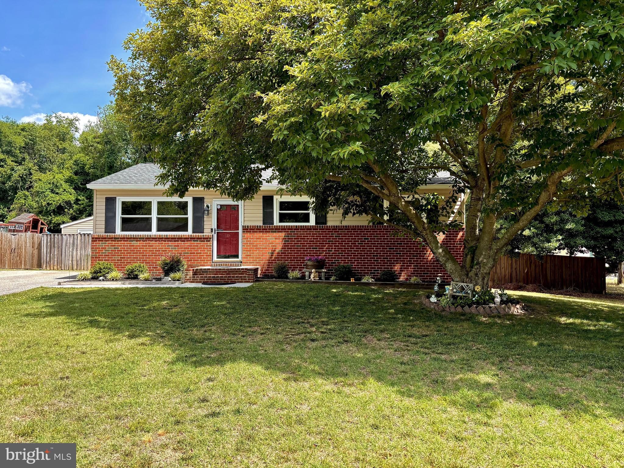 Welcome to 464 Martin Drive, a beautifully updated home tucked away in a neighborhood in Millersville while still offering a convenient location for commuting, shopping, restaurants, and everyday needs. This desirable ranch-style home backs to the woods offering exceptional privacy.  The home boasts flexible living space, thoughtful improvements, and an incredible outdoor setup.

The main level features three bedrooms and a recently renovated full bathroom, along with a bright, comfortable layout that has been freshly painted throughout. The remodeled kitchen offers an updated feel and is ready for everyday living, entertaining, and everything in between.

The lower level expands the possibilities with an additional bedroom, a new full bathroom, a spacious recreation room, and a dedicated storage area. Whether you need guest space, a home office, hobby area, or room for multigenerational living, this level gives you plenty of flexibility.

Outside, the property shines with a large, flat, fully fenced yard and a 20 x 20 detached workshop that has electric, heat, and window air conditioning, perfect for hobbyists, storage, equipment, projects, or creative workspace. The home also offers several valuable updates, including all-new windows, a newer well pump, new oil tank, new front porch and walkway,  updated bathrooms, newer landscaping, and more. The property currently has well and septic service with Well Guard well insurance.

Major improvements include: interior repainting in 2026, all new windows in 2026, new basement full bath in 2024, renovated first-floor bath in 2024, new landscaping in 2024, hardwood floors throughout first floor in 2019, front porch and walkway in 2022, HVAC in 2021, new 275-gallon oil tank in 2021, holding tank in 2021, plumbing in basement in 2021, roof in 2015, septic and drain fields in 2004, plus fence post replacements and new double gate in 2024.

With its updated interior, usable lower level, spacious yard, and exceptional detached workshop, this Millersville home offers comfort, function, convenience, and room to grow.