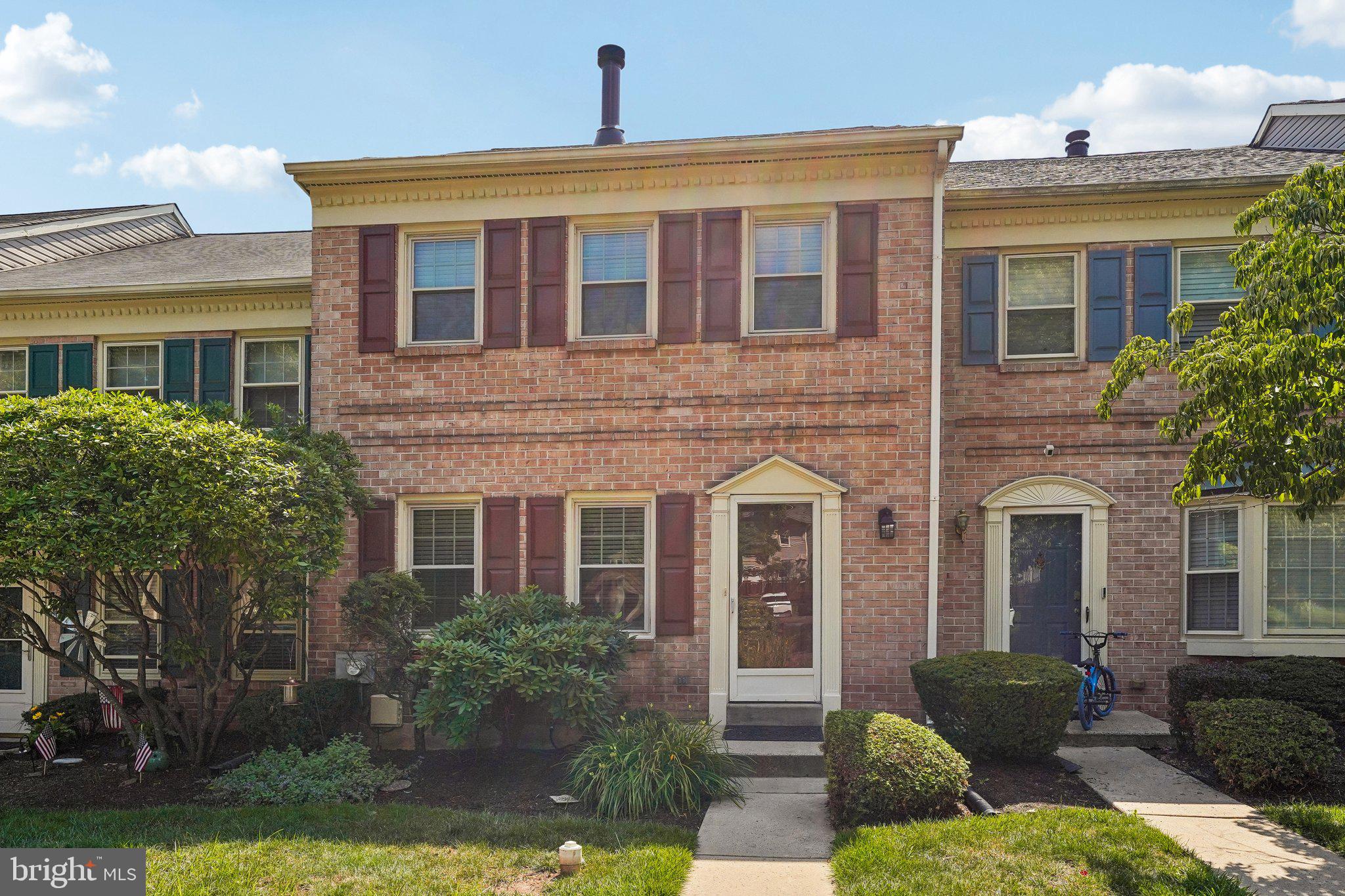 Welcome to this beautifully maintained 3-bedroom, 2.5-bath townhome featuring stylish updates and comfortable living spaces throughout. The remodeled primary bathroom and hallway bathroom offer a fresh, modern feel, while luxury laminate flooring, elegant crown molding, and custom built-ins enhance the entire first floor. A stunning double-sided fireplace serves as the focal point between the spacious living room and the kitchen's dining and sitting areas, creating the perfect setting for relaxing or entertaining.

The kitchen is equipped with stainless steel appliances and overlooks a peaceful open green space. Step outside to the remodeled Trex deck, an ideal spot to enjoy your morning coffee or unwind while taking in the serene backyard views.

The finished walkout lower level expands your living space with a large family room, a separate office or flex room, generous storage closet, and an oversized laundry room complete with washer and dryer. Sliding glass doors lead to a patio, providing additional outdoor living space. Additional updates include a new HVAC system installed in 2025, offering comfort and peace of mind. This move-in-ready home combines modern updates, functional living space, and a desirable setting.