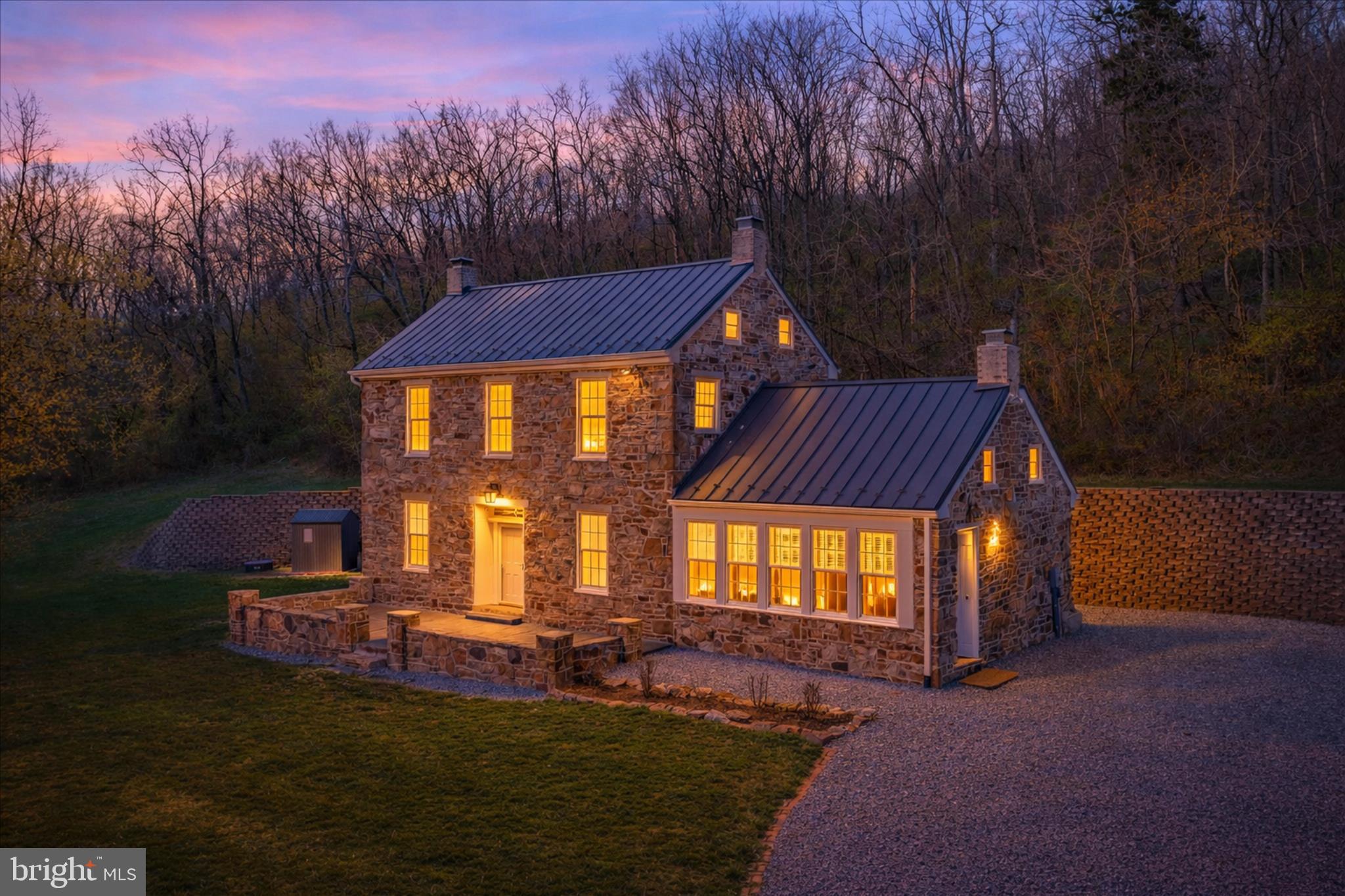 Spectacular Views! Location! Privacy! 10.08 acres! Stone House! 5% Owner Financing Available!
Amazing 2-story German Colonial stone house right off Rt. 40 and minutes to I-70. Minutes to Hagerstown, Frederick, West Virginia, and White Tail Ski Resort. Home sits on 10 acres surrounded by conservation area (privacy). Spring water fed well with below ground PEX (cross-linked polyethylene) water lines, central air and cooling. Cable ready. Below ground 300 gallon propane tank that serves stove, on demand gas hot water heater, and gas fireplace inserts. Exterior walls almost 2 feet thick. Thick hardwood floors throughout. Maintenance free metal roof. Fully renovated kitchen with granite countertops, stainless steel appliances, gas stove, microwave, 2 ovens, fireplace, and built in wine rack.
Living room with gas fireplace. Formal dining room with gas fireplace and built in bookcase. 2+ bedrooms, 1.5 bathrooms tub and walk-in shower. Two full walk-in attics. Huge front patio. Storage shed and barn. 1000 gal septic with proper drainage field. Possibility for combined zoning. Owner financing available at
5% interest rate with 10% to 20% down payment depending on credit rating, employment.