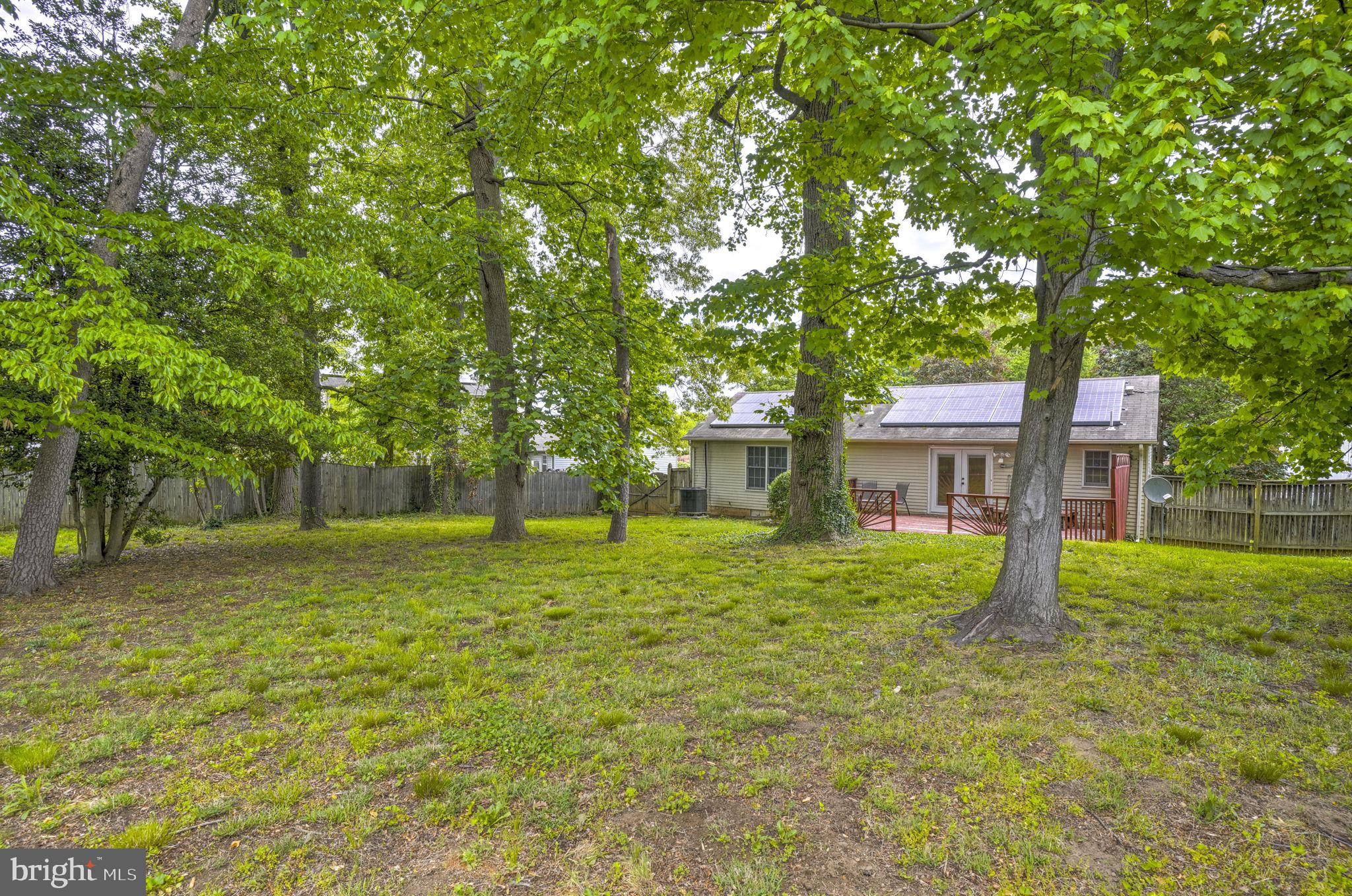 Welcome to this charming single-family rambler offering comfortable one-level living in Upper Marlboro. This 3-bedroom, 2-bath home features a spacious primary suite with its own private bathroom for added convenience. Enjoy easy indoor-outdoor living with a deck just off the kitchen, accessible through double glass doors, overlooking a fully fenced backyard perfect for relaxing or entertaining. Ideally located for everyday convenience, the home is close to shopping, restaurants, metro stations, and major highways, with the added benefit of energy-efficient solar panels.
