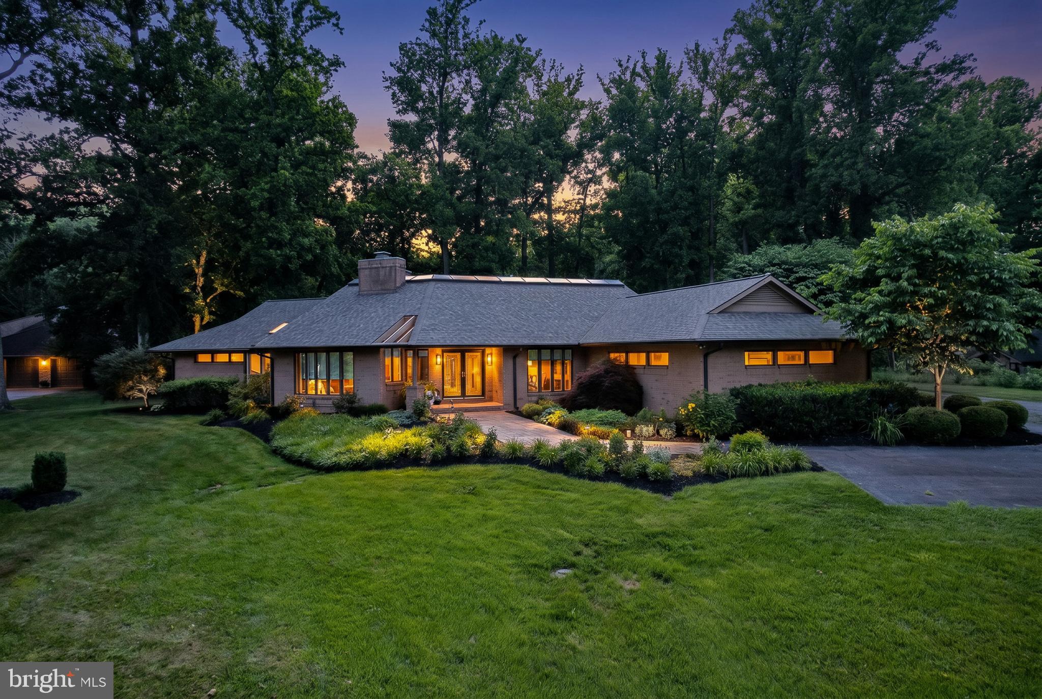 Nestled on 1.26 beautifully landscaped acres in the prestigious Todd Lakes community, this custom built 5 bedroom, 4.5 bath home offers over 4,580 finished square feet designed for comfortable everyday living and effortless entertaining. The thoughtfully designed floor plan features main level living, a renovated kitchen, stunning primary suite, engineered wood floors, four fireplaces, two pellet stoves, and a finished lower level complete with a second kitchen. Enjoy year round views from the sunroom filled with skylights, or relax on one of the screened porches overlooking the private grounds. Unique features include a Trombe wall passive solar heating system, smart home technology, underground pet fence, and extensive hardscaping and landscaping. Major updates include a new roof, gutters, and skylights in 2023, plus well, heaters, and HVAC updates. A rare opportunity to own a thoughtfully updated estate offering luxury, efficiency, and flexibility in one of Bel Air's most sought after communities. - Check out the video and 3D tours.