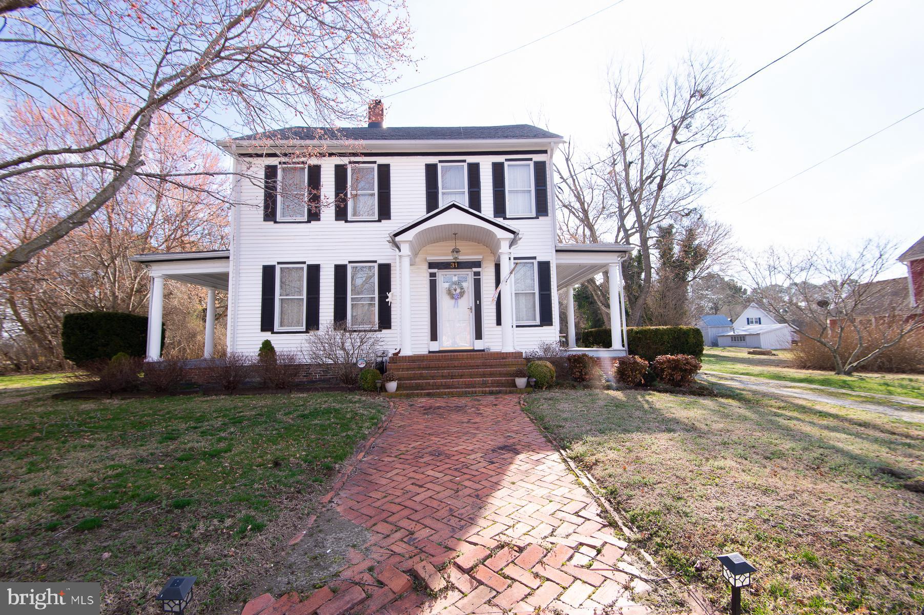 31 Main Street – East New Market, Maryland
Step back in time and experience the charm of this 1920 Victorian-style home located in the Historic
District of the Town of East New Market. This home showcases many of its original architectural details
and period character while offering several important modern updates. Over the years, the property has
seen numerous improvements, including a new roof installed approximately five years ago, updated
flooring, plumbing improvements, and an electrical upgrade. The furnace was replaced just two years
ago, and a new hot water heater has also been installed. The home is currently heated with a pellet
stove that conveys with the property, providing an efficient and cozy heating option. While the home
does not currently have central air conditioning, a mini-split system could easily be installed to provide
modern cooling while preserving the home’s historic character. Located in the heart of the charming
Town of East New Market, residents enjoy a strong sense of community and a full calendar of events
including Easter celebrations, May Day festivities, the annual Fourth of July celebration, and many
other community gatherings throughout the year. The town is also planning a new amphitheater at
Friendship Park, which will provide an exciting venue for concerts, educational programs, and
community events. East New Market is known for its historic charm, welcoming community, and
small-town character, making it a wonderful place to call home. Schedule your private showing today
and come see the character and potential this historic home has to offer. Professional photography will
be available soon. Important Note: The property tax amount estimated in the listing may not be
accurate. Buyers are advised to verify the current tax information with the Dorchester County Tax
Office