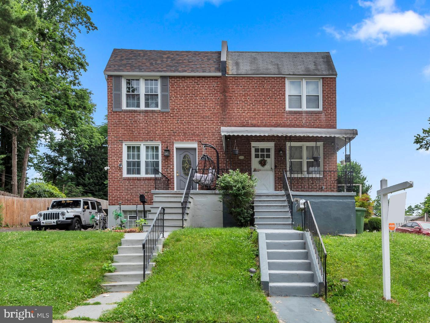 ** Opportunity awaits in Rosemont East! ** This 3-bedroom, 2-bath semi-detached home offers space, sunlight, off-street parking, and the chance to create something truly special. Perfect for a buyer with vision, this home features a living room, separate dining room, and an updated kitchen with custom cabinetry, countertops, and ceramic flooring. The kitchen opens to a rear deck with great potential for outdoor dining, plants, container gardening, or entertaining, and the deck overlooks a large backyard with plenty of room to garden, relax, or design your ideal outdoor retreat. A covered front porch offers even more outdoor living space and could be a welcoming spot for patio furniture and quiet evenings. The front parking pad offers space for multiple vehicles, a valuable convenience that makes daily living easier. As a semi-detached home, the property benefits from natural light on three sides, creating a brighter feel than many interior rowhomes. The lower level includes a finished club room-style area with a mini bar that will remain, plus a full bath, laundry area, and walk-up access to the backyard. The home's layout, yard, parking, and location make it a strong opportunity for a buyer ready to add personal touches and TLC to build value over time. Convenient to Northern Parkway, Fleetwood Avenue, downtown Baltimore, I-95, and I-695, as well as routes connecting to Baltimore County and Harford County, this Rosemont East home is full of possibility.