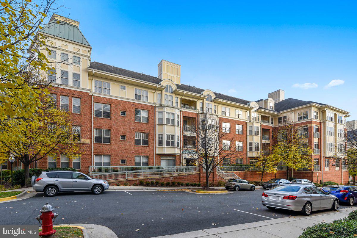 Welcome home to this beautifully updated 2-bedroom, 2-bath condo in the sought-after Stratford Park community in Reston. Ideally situated on the first floor of an elevator building, this inviting residence offers easy outdoor access and effortless everyday living. Inside, you’ll find updated stainless steel appliances and a bright, functional layout designed for comfort and convenience. Fresh new paint throughout & new carpet in the bedrooms. Enjoy the ultimate work-live-play lifestyle with Stratford Park’s exceptional amenities, including a clubhouse, fitness center, pool, on-site property management, responsive maintenance, affordable handyman services, and seamless guest parking. Directly across the street, experience all that Reston Town Center has to offer—over 50 retailers, 35 restaurants, a multi-screen cinema, seasonal ice skating, and year-round events from art festivals and farmers markets to outdoor yoga and free summer concerts at the Pavilion. Commuting is effortless with the nearby Reston Town Center station on the Silver Line. Daily essentials are just steps away at Whole Foods Market and Harris Teeter. Outdoor enthusiasts will love the direct access to the Washington and Old Dominion Trail (W&OD Trail), along with nearby parks, greenways, and tennis courts. With convenient access to major commuter routes and a peaceful setting that offers urban-core living without the noise, this home delivers the very best of Reston’s walkable, thoughtfully planned community—right at your doorstep.