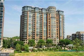 UNIT IS VERY CLOSE TO GARAGE ELEVATOR. ONE OF THE MOST LUXURIOUS & ELEGANT NEWER BUILDING IN THE TYSONS CORNER. 1,329 SF LIVING SPACE FEATURES 2 BR + 2 FULL BATH. 10TH FL  CORNER UNIT. PANORAMIC VIEWS WITH 2 SIDE WINDOW, 2 GARAGE SPACES & STORAGE UNIT. BEAUTIFUL HARDWOOD FL. GOURMET KITCHEN W/GRANITE COUNTERS. FULL SIZE W/D. ENJOY PRIVATE BALCONY. ROOF TOP POOL/SUNDECK. 24HR DESK. FITNESS CENTER.GUST SUITES. STEPS TO HARRIS TEETER. CLOSE TO METRO.