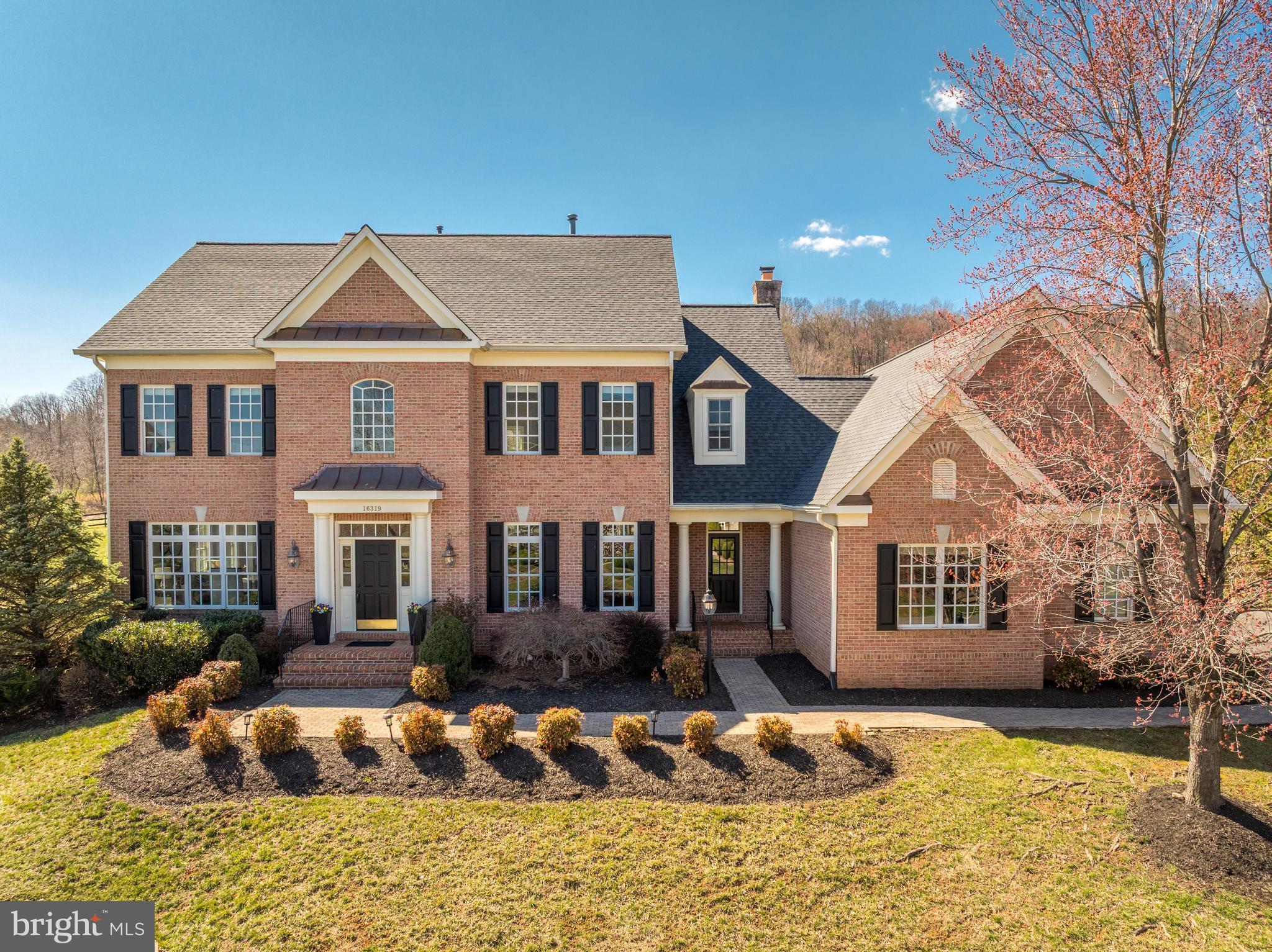 Rarely available! Marquis Custom home  backing to open space and the 2nd Fairway of the Raspberry Falls Golf Course. When it's time to relax and unwind you will LOVE coming home to this gorgeous golf course community, located on almost 900 acres including dedicated open space.  Enjoy  the benefits of living  a few miles from the Potomac River,  Downtown Leesburg and Morven Park.  This home and community have something for everyone. It starts with a well designed open floor-plan including 5 bedrooms and 5 and 1/2 baths, 10' ceiling, 8' interior doors on the main level , finished in-place hardwood floors, oversized transom windows  and wood burning fireplace. You will also find a  private study with French doors, living room with oversized windows, dining room with extensive millwork and Gourmet kitchen with large center island , abundant storage and convenient access to backyard deck, gazebo patio and grill.....all of the ingredients for outdoor cooking, entertaining  and fun!   The upper level boasts 4 bedrooms and 4 full bathrooms, including a luxury primary bedroom suite with gorgeous views. The 3 additional upper level bedrooms have updated ensuite baths.  When its time to relax head to the finished lower level, completed with media room, guest bedroom,  full bath, wet bar, large recreation room and outside access  The oversized side load garage, extended driveway and fenced in rear yard are great features. This is a home you will enjoy for years to come!