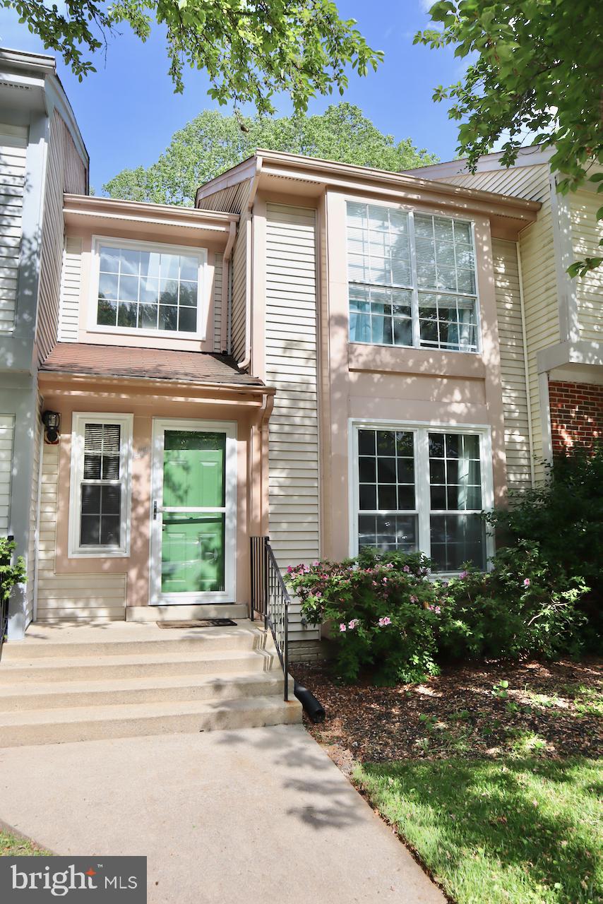 NEW PRICE!!     Spacious Renovated  Townhome in the Tivoli  Community!   Chef's kitchen with newer shaker  cabinets and counters, stainless appliances, french door refrigerator,  breakfast bar,  Table space Kitchen,  Wood burning fireplace,  Bedrooms have vaulted ceilings,    Both full  bathrooms have been updated!  Lovely park like street & Views,   Sunny deck overlooks private  trees,  Fully finished walk out bsmt with recessed lighting & 1/2 bath,  Full size Washer & Dryer, + large extra storage room + 2 more great storage closets,  Move in by May 7th,    (1).  dog okay, 45 pounds or less,  NO CATS,   parking spot 188 + unassigned parking,  Don't miss this home!