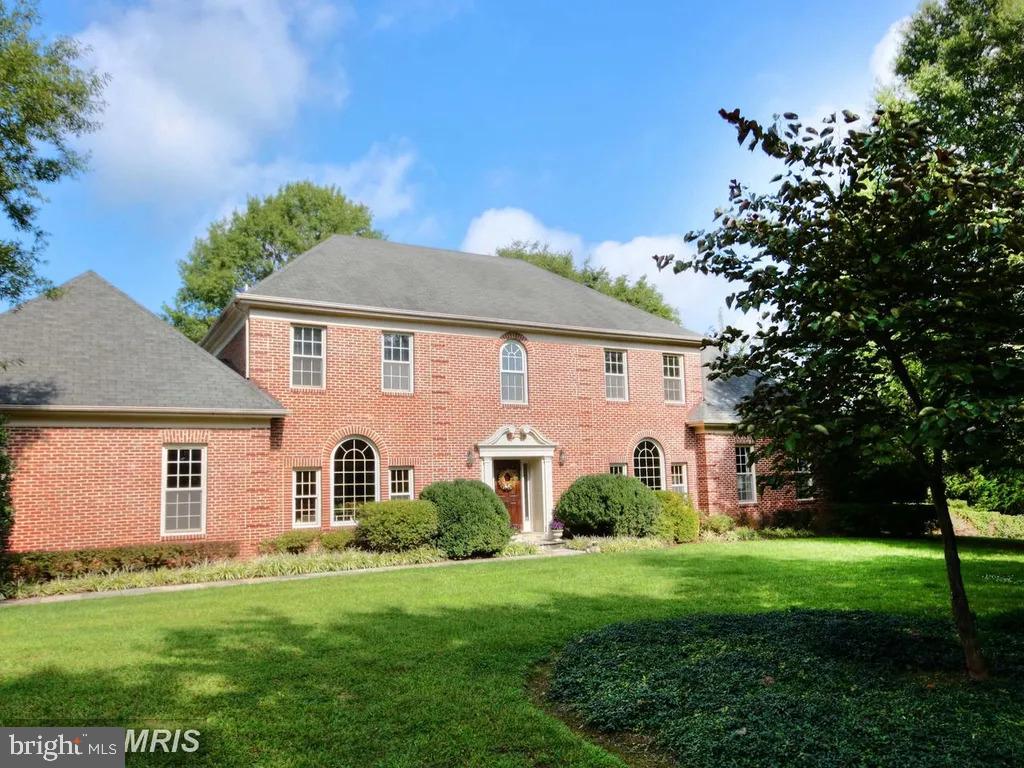 Welcome to 10506 Milkweed Drive, a stunning custom-built colonial nestled on 5 picturesque acres in the heart of Great Falls, Virginia. This newly updated elegant all-brick estate offers the perfect blend of luxurious living, timeless design, and private outdoor amenities—ideal for entertaining and everyday comfort.

Step inside to over 5,000 square feet of beautifully appointed living space featuring 4 spacious bedrooms, 4 full bathrooms, and 1 half bath, plus an additional  bath in the pool house. The main level showcases a brand new gourmet kitchen complete with quartz countertops, a large center island with seating, and top-of-the-line appliances—perfect for culinary enthusiasts and casual family meals. The spacious living room, formal dining room, and great room are all welcoming to family and friends. The home also boasts a grand home office with custom woodwork, ideal for remote work or a private study.

Relax in the stunning primary suite, a true sanctuary with two walk-in closets and a sun-drenched sitting room framed by floor-to-ceiling windows. The newly renovated primary bath has dual vanity, stand alone tub and shower, plus private privy.  The 3 additional upstairs bedrooms include one  en-suite full bath and 2 with connecting shared full bath for a total of 3 full baths on the upper level.

The lower level offers versatile living space, including two bonus rooms with closets, a shared full bath, a cozy recreation room with fireplace, a wine cellar, and a dedicated laundry room.

Step outside to your private backyard oasis. A resort-style pool is complemented by a charming pool house with bathroom, shower/changing room, mini bar and flex space.  the expansive patio, and sport court finish out the area for endless outdoor fun. The lush pasture and long private driveway enhance the estate’s charm and seclusion.  

This exceptional property is a rare offering in one of Northern Virginia’s most prestigious communities—minutes from top-rated schools, Great Falls Elementary, Cooper Middle, and Langley High School, fine dining, shopping, and major commuter routes.