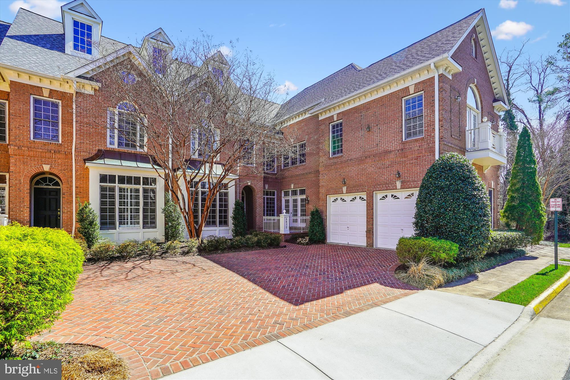 Rarely available, this fabulous brick home in the Farrcroft Community offers luxury living in a private, park-like setting. The home backs to woods with walking paths and a view of a pond! This spacious home boasts over 5,000 Sq ft of living space with 3 bedrooms, 5 full baths, a main level office and a finished walk-out lower level. 
Boasting timeless design with classic details, this home has it all!  The main level includes a gracious family room with a gas fireplace and tons of natural light. There is a gourmet kitchen with stainless steel appliances, breakfast bar, breakfast room and large pantry. A formal living room , dining room, plus an  office and full bath, complete the main level. Upstairs, the luxurious primary suite awaits, complete with spa like bath, ideal for unwinding after a long day. Don't miss the beautiful detailed tray ceiling in the primary suite, there are two generous sized walk-in closets and an attached sitting room.
The upper level also features a large bonus room over the garage with a custom built-in wall unit and access to the front balcony. The laundry room is located on the upper level. There are two additional bedrooms, each with it's own en-suite bathroom and walk-in closet, ensuring comfort and privacy for all.
The walk-out lower level offers an expansive recreation room with a gas fireplace and access to the rear courtyard.  There is also an office/flex space, media room, full bath and utility room. The home has a two car garage. There is a private landscaped courtyard featuring a flagstone patio, perfect for relaxing outdoors. Enjoy the exclusive amenities of the Farrcroft Community, coupled with the convenience of Fairfax City living.  There are  wonderful restaurants, shops and library, all within walking distance. Close to GMU, Metro and major commuter routes. This home is a must see!