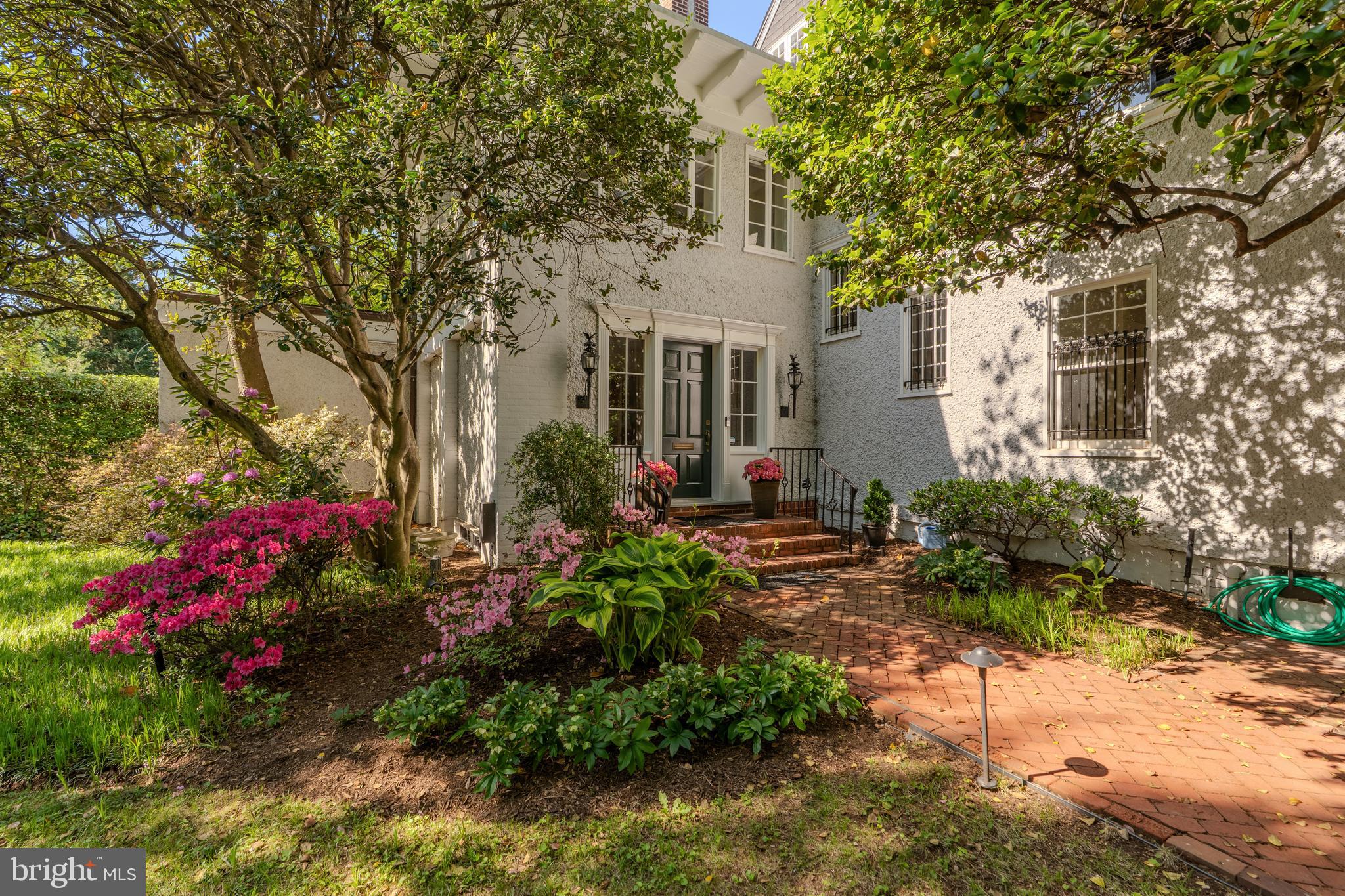 Tucked into one of Cleveland Park’s most admired stretches, 3556 Macomb St NW is the kind of house that feels genuinely lived in and loved. It's comfortable, gracious and quietly special in all the right ways.
Set on a rare double lot, the home blends classic Washington architecture with an easy livability that’s sometimes hard to find. Beautiful natural light, generous room sizes, high ceilings and long sightlines create spaces that feel open, welcoming and effortlessly functional.
The main level unfolds naturally from room to room with spaces designed as much for everyday living as entertaining. A breathtakingly beautiful library, a sunroom overlooking the grounds and rear-facing rooms offering magnificent views of the Washington National Cathedral give the home a real sense of warmth and place. Even the primary bedroom captures that iconic Washington National Cathedral view.
Outside, the property becomes something truly rare for the city: a large wrap around front yard, mature landscaping, an incredible 50-foot pool that makes the setting feel more like a private retreat tucked into the middle of Washington and a detached garage.
Currently being thoughtfully prepared for market, the home is entering its next chapter with careful attention to presentation while preserving the character and personality that make it so memorable. A rare opportunity to own a substantial Cleveland Park residence with scale, charm, and timeless appeal.