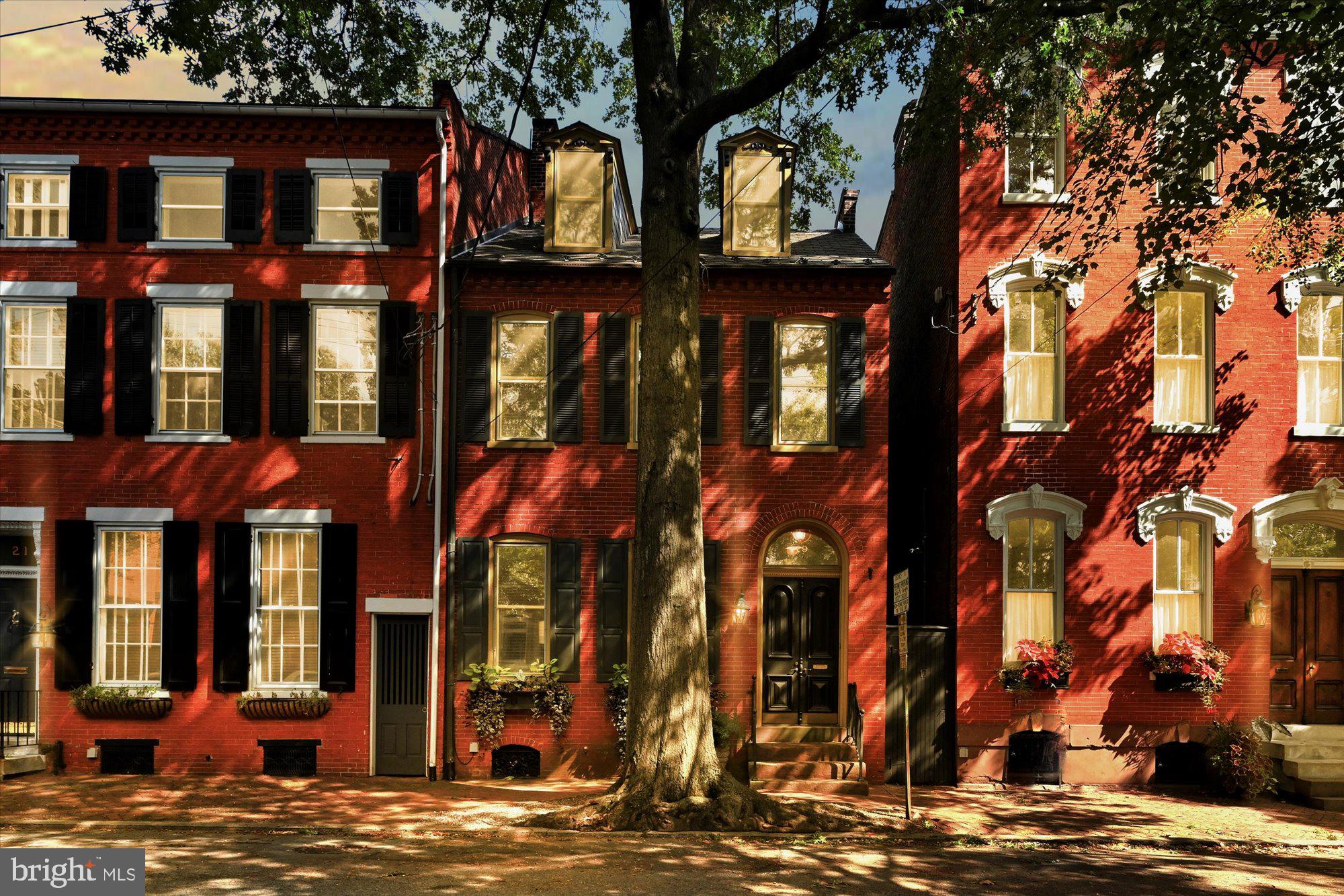 Late 19th Century  End-Unit Townhome on a Historic District block of N. Shippen St.  Much of the original interior/exterior fabric still exists.  Two Marbelized Slate Ornamental fireplaces, large Living Room w/crown molding.  Formal Dining Room w/double door closet, Front & Back Stairway. Lots of Basement Storage possibilities. New storm windows and new gutters w/gutter guards. Private fenced yard w/ lg. brick patio amid lush landscaping is a perfect place to escape for relaxation. A wonderful opportunity in a great location!!