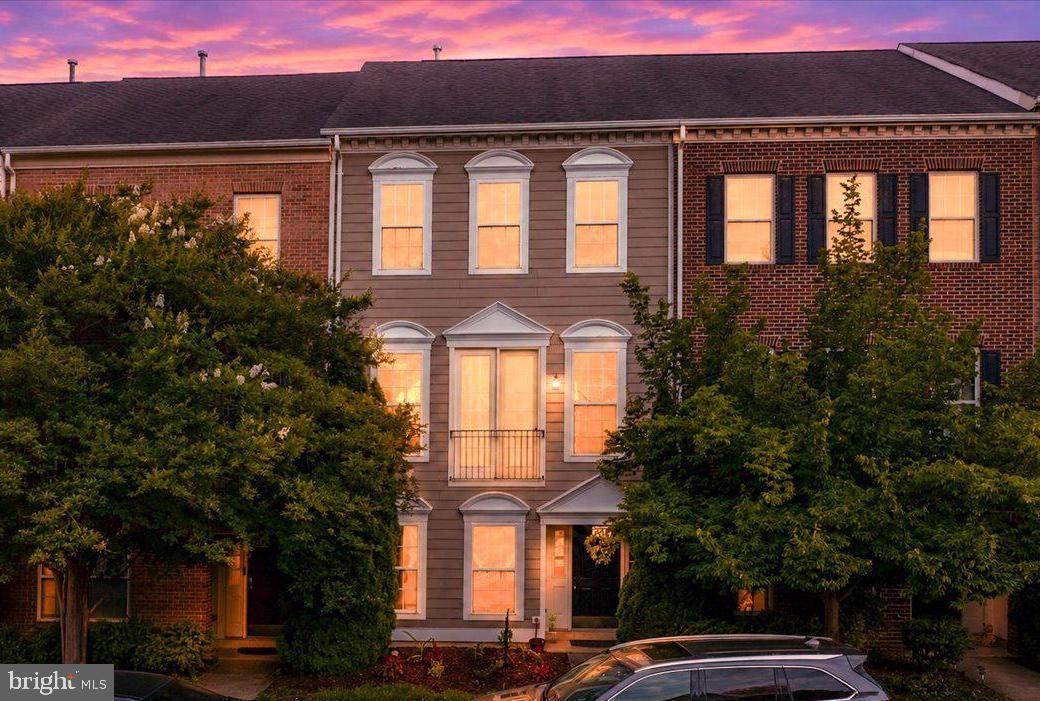 Welcome to the best of the best in Frederick County, The Villages of Urbana, a Natelli Community holds some of the best kept secrets in the Frederick Area.  From Community Shopping areas, to amazing Community Pools, basketball courts, tennis courts, walking paths, ponds, recreation center, and so much more, all just a stones throw (with a strong arm) to 270 and easy commuter access.  On the way home, jump off 270 BEFORE the crazy Frederick slowdown and call Urbana home.  This wonderful Classic Corporation Townhome offers nearly 2400 square feet of elegance, decked out with renovations completed in 2026 to include new flooring, paint, appliances, deck renovation, lighting, bathrooms, sodded rear yard, and more.  This home is ready for new ownership and the sellers are dedicated to making the transition smooth and easy.  The huge family room features tons of natural light, a gas fireplace, stone surround, mantle, and soaring ceilings.  The dining area is wide open and adjoins the kitchen with granite countertops, new appliances, large pantry, breakfast bar, and table space.  The lower level features a ground level bedroom and connecting full bath and a large rec room to the rear.  Upstairs you will find a large master suite with double closets connected to a large and spacious owners bath.  Up another small set of stairs takes you to two more bedrooms and a separate full bath.  There is ample closet space throughout and a storage room in the lower level.  The detached garage features rear alley access, a garage door opener, and freezer.   The deck has been totally repainted and treated making this home a true masterpiece.