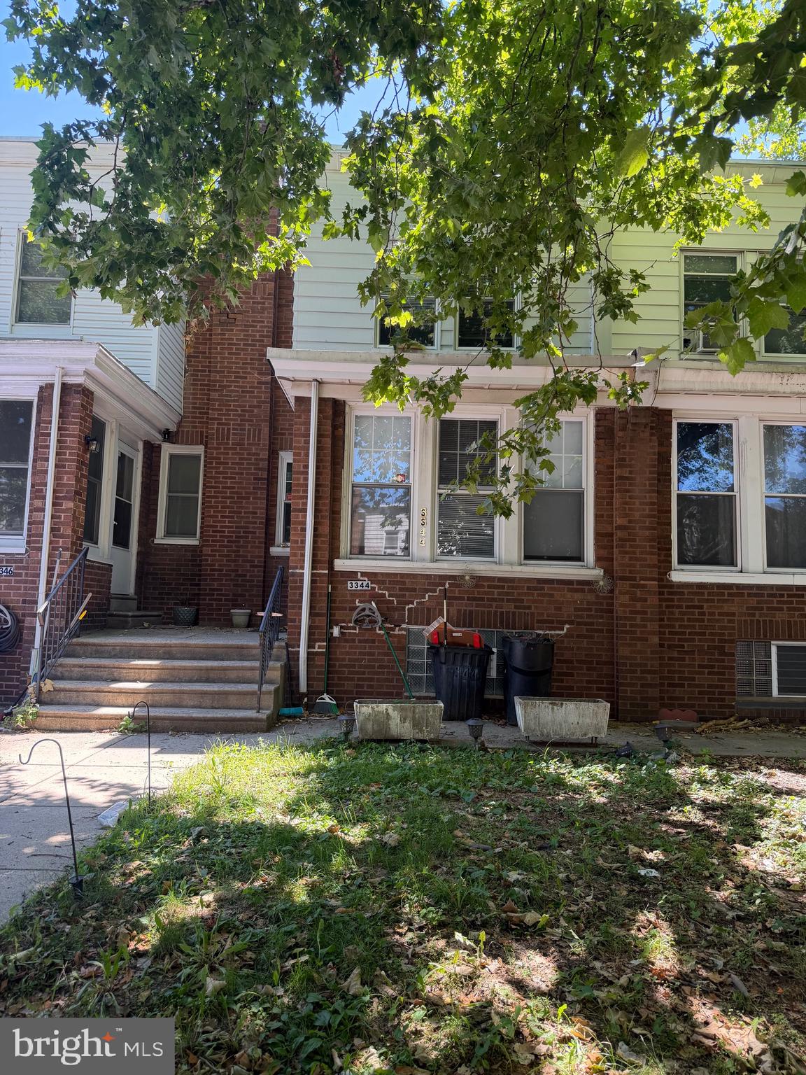 Welcome to this charming 3 bedroom, 2 bath townhouse in the heart of Mayfair.Filled with character and potential, this home offers a spacious straight-thru layout, a classic brick exterior, and a full basement with one full bathroom and a small kitchen for in law suite.Conveniently located near neighborhood shops, restaurants, parks, school and public transportation. Being sold as-is, this is a wonderful opportunity to make it your own and create a place to call home.