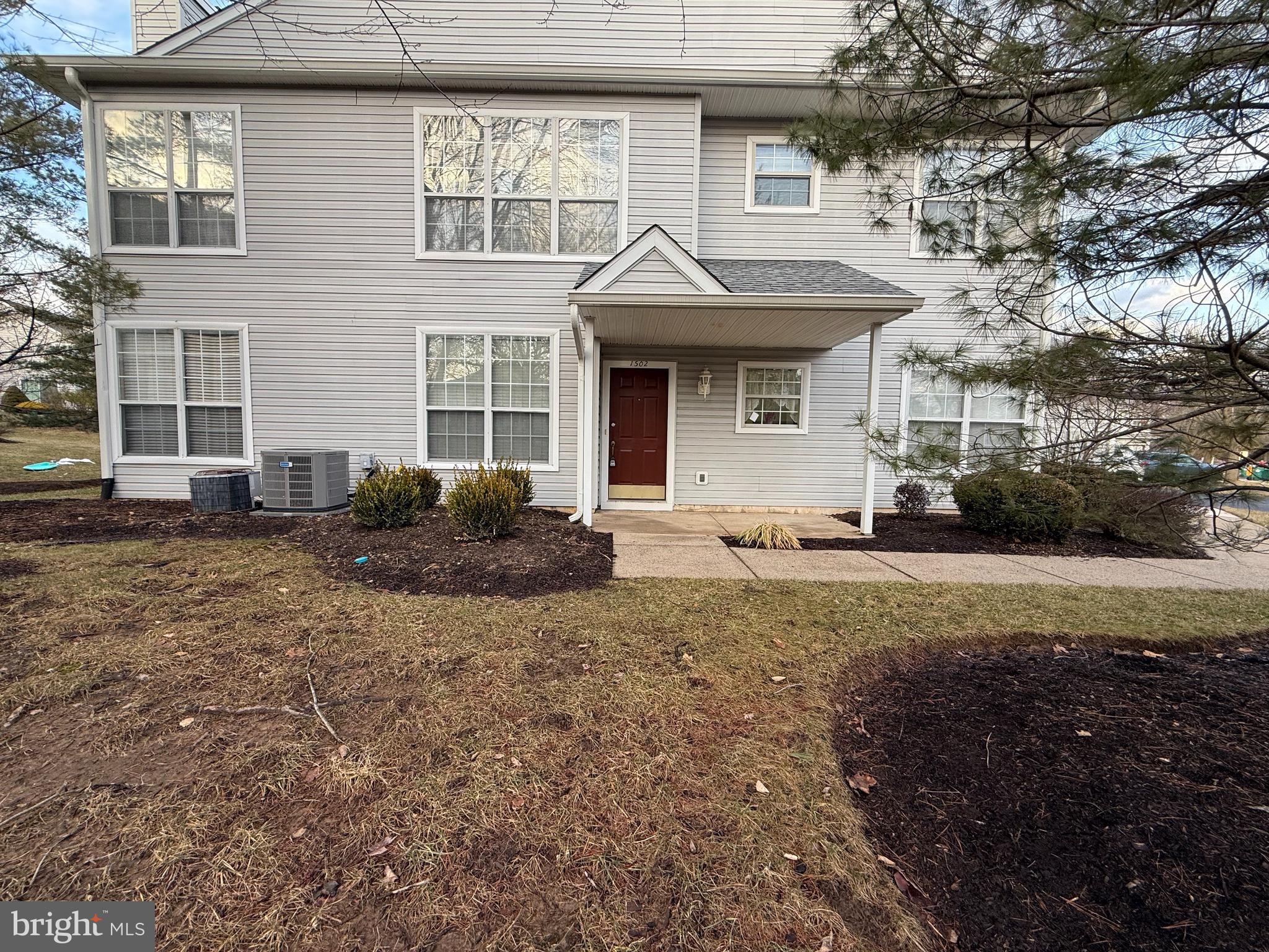 Welcome home to 1502 Waterford Rd. This is a highly sought after first floor unit in the desirable Brookstone development. This unit comes equipped with a driveway and garage, perfect to keep your car or additional storage space. The flooring in the living room and bedrooms has been redone with luxury vinyl planking. Walk directly into the home from the attached garage and down the hallway to an open concept living room. There is a  fireplace in the living room. Directly off the living room you have access to your private patio, which is perfect for enjoying a morning cup of coffee. Off the living room is your freshly painted eat-in kitchen equipped with an electric stove, built in microwave, and dishwasher. Continue down the hall from the living room to 2 spacious bedrooms and bathrooms. The primary bedroom offers an attached ensuite bathroom and 2 large closets. The second full bathroom is located directly across from the second large bedroom. Community amenities offer a pool, tennis court, and playgrounds!  Located in Pennsbury School District too! Commuting and traveling will be a breeze with easy access to 95. Don't miss out; schedule your appointment today!