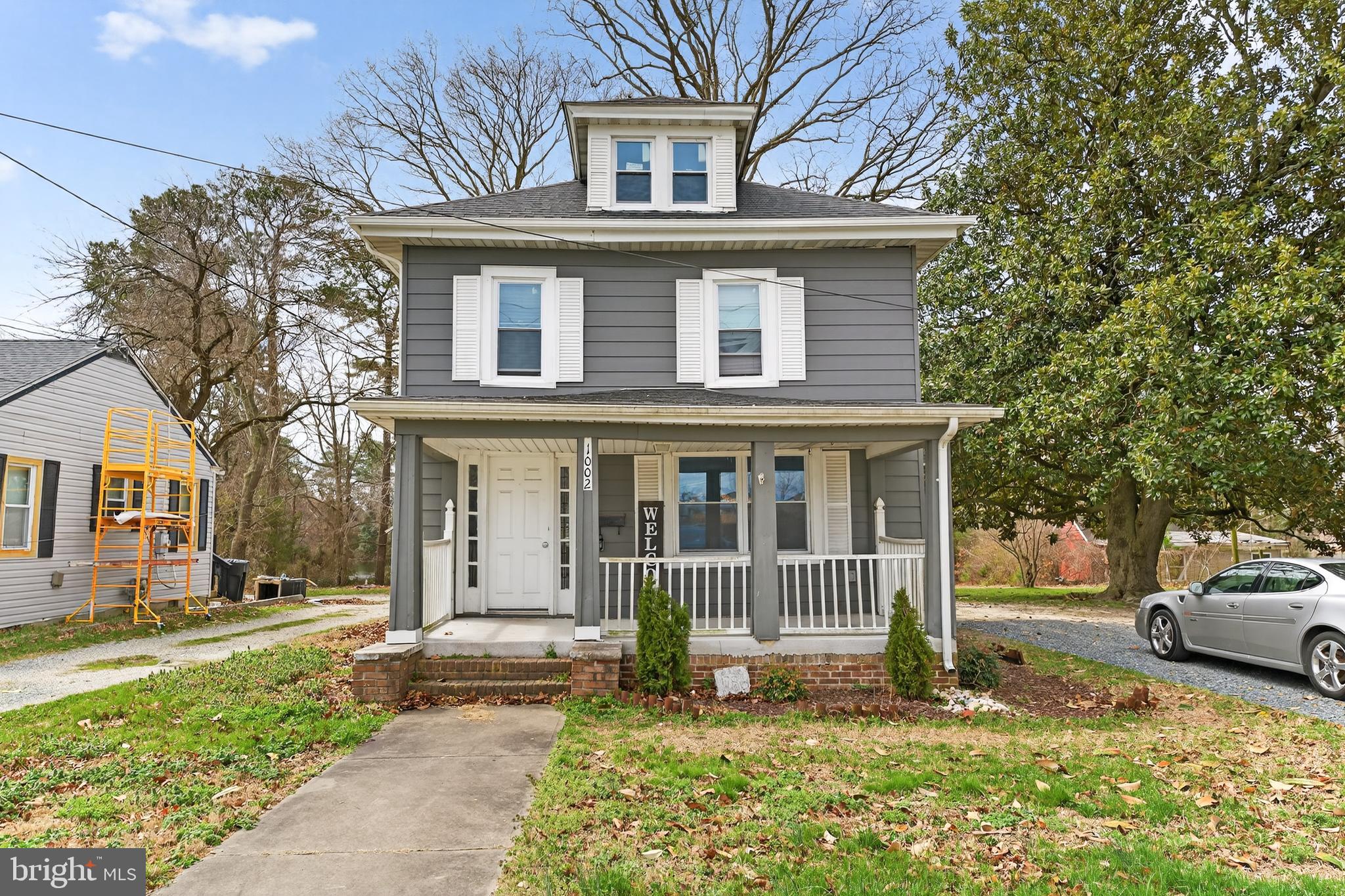 * * * WATERFRONT * * * Updated 3-4BR/2BA American Foursquare with private dock and little pond-front beach. Updates galore - vinyl replacement windows, gorgeous + durable luxury vinyl plank flooring throughout, architectural-shingle roof, kitchen, baths, fixtures, + more! Charming front porch leads into the welcoming foyer. Spacious living room. Bright + cheery kitchen - granite counters, dining area, breakfast bar + nook. 1st floor BR w/ full, en-suite bath - could also function as a study or guest room. Upstairs, 3 additional bedrooms, 2nd full bath. Unfinished basement completes the home's interior. Enjoy autumn mornings on the large deck overlooking your expansive pondfront yard. Great location - minutes to locals' favorite shopping, dining, + plenty of community events in Downtown Salisbury. Conveniently located to public parks, golf, beloved Salisbury Zoo. Sizes, taxes approximate
