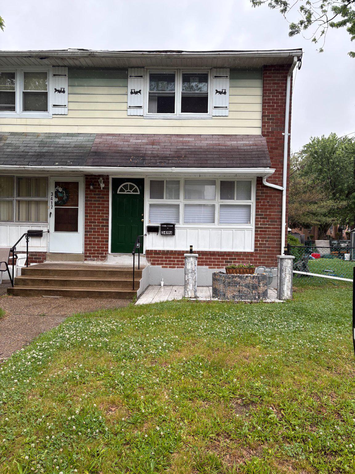 ***Updated and Back on the market & Priced Reduced*** Welcome to this exceptional end unit townhouse with two units.  Features an extra-large side yard offering incredible versatility and income potential! This thoughtfully designed property features a spacious 3-bedroom, 1.5-bath main residence upstairs unit w/ New Windows, along with a fully finished studio apartment in the basement – ideal for multi-generational living or generating rental income.  You can live in one unit and use the rent to pay the mortgage.

The main level features comfortable living spaces with gas heat and hot water, offering three generous bedrooms and one and a half bathrooms to meet your family’s needs. As an end unit, you’ll enjoy additional natural light and the rare advantage of extra side yard space, ideal for outdoor entertaining, gardening, or play areas.

The lower level has been professionally finished into a completely independent studio apartment, featuring its own full kitchen, full bathroom, and modern electric heat and air conditioning for year-round comfort. This self-contained unit offers excellent rental income potential or serves perfectly as an in-law suite, home office, or guest quarters.

Additional highlights include off-street parking with a private driveway – a valuable commodity in any neighborhood. The end-unit location provides enhanced privacy and the bonus of extra outdoor space.

This is more than just a home – it’s a smart investment opportunity. Live in one unit and let the other pay your mortgage, or enjoy the flexibility of multi-generational living. Don’t miss this rare chance to own a property that works as hard as you do!