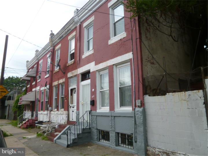 Incredible invesment oppurtunity with this 5 bedroom 2 full bath row! This home has been rented to students for years and is in a great area located close to University! The property has been recently rehabbed throughout with new kitchen,central air, alarm system, updated baths, new gas heat, new plumbing. Five Bedrooms will offer a great return on Investment. Hardwood floors, modern kitchen, full basement. All offers will be presented, EZ to show and see.  Agent: property has a lockbox, key pad and alarm... please follow instructions on showingtime