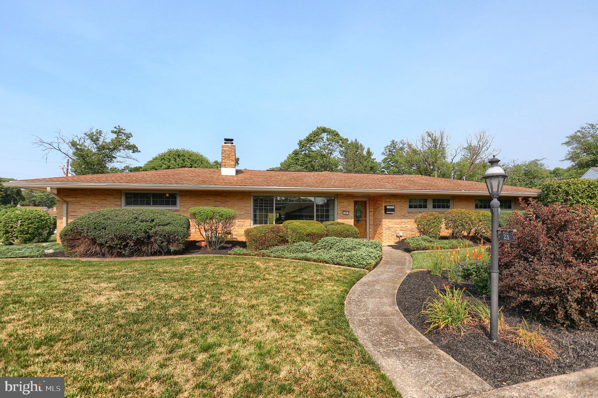 After nearly 40 years of cherished ownership, 23 Columbia Drive is ready to welcome its next owner. This beautifully maintained 3-bedroom, 3 full-bath ranch in Cedar Cliff Manor offers exceptional curb appeal with timeless landscaping  that makes a lasting first impression.

Step inside to find hardwood floors throughout the main level and a large picture window that fills the living space with abundant natural light. The custom kitchen is a standout, featuring granite countertops, tile flooring, and quality finishes. The primary suite includes oversized windows and a beautifully designed custom tile shower that maximizes both style and functionality. Recently replaced windows and exterior doors throughout are modern & provide maximum efficiency. 

A climate-controlled sunroom extends the living space and provides the perfect spot to enjoy the beauty of every season in comfort. The finished lower level offers nearly an additional full level of living space, complete with a second kitchen, full bath, expansive recreation area, laundry, storage, and endless possibilities for entertaining, guests, or multi-generational living.

Outdoor living is just as impressive. A paver walkway leads from the sunroom to a built-in gas fire pit, creating the perfect gathering space for relaxing summer evenings. Low-voltage accent lighting enhances the ambiance long after the sun goes down.

Additional highlights include an attached two-car garage, economical natural gas heat, and central air for year-round comfort. This is a rare opportunity to own a thoughtfully updated home in a desirable neighborhood that has been lovingly cared for nearly four decades. Agent is related to seller.