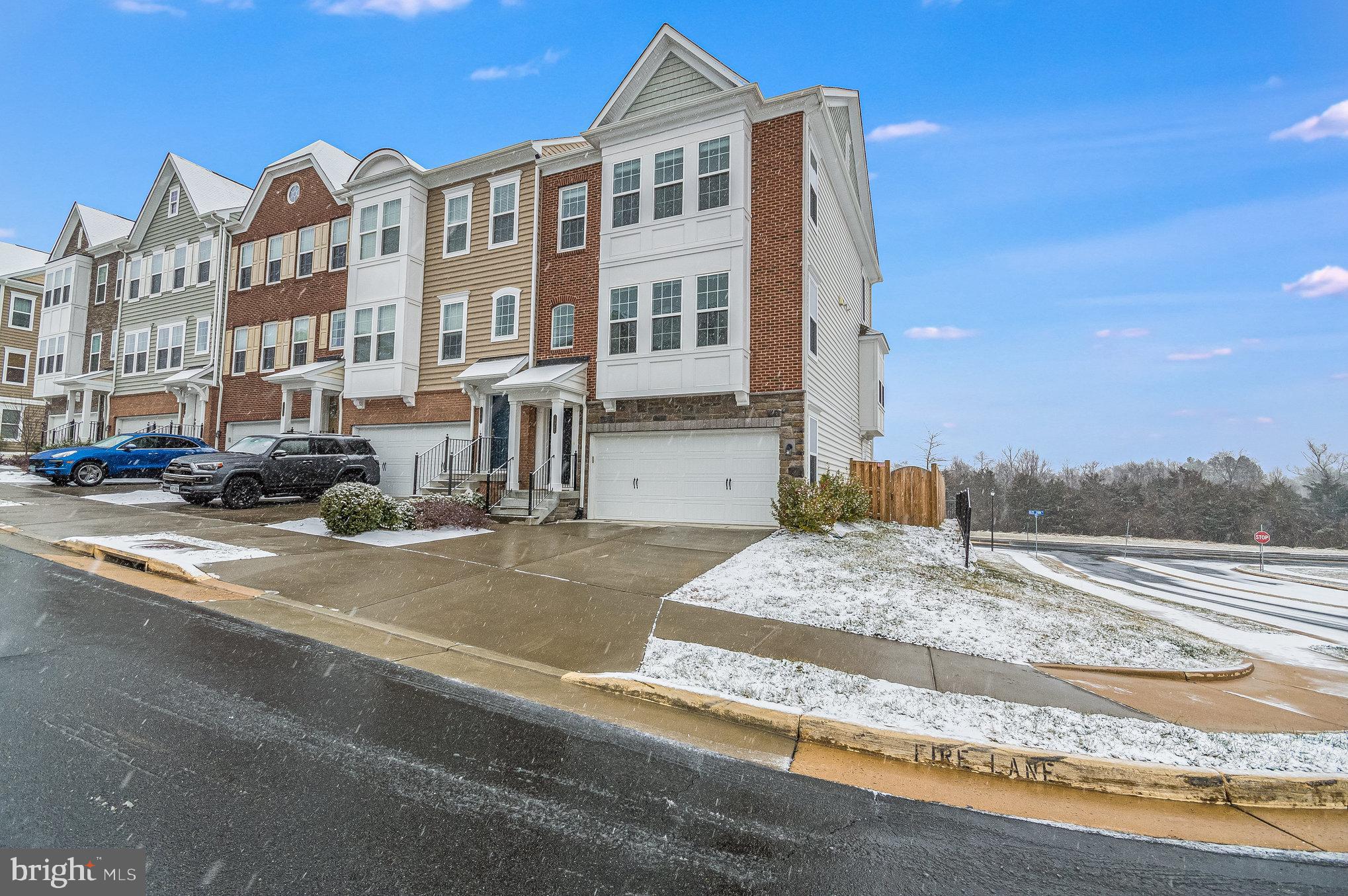 Beautifully maintained, like-new, end unit townhome with a striking brick front and a fantastic rooftop terrace! This four-level gem includes a 2-car garage with an extended driveway. The main level boasts an open floor plan, abundant natural light, gleaming hardwood floors, a gourmet kitchen with stainless steel appliances, upgraded cabinets, granite countertops, an extended kitchen island, and a stylish tile backsplash. The dining and family rooms are spacious and open to a large deck. Upstairs, the primary bedroom features a luxurious en-suite bathroom, accompanied by two generous bedrooms and another full bathroom. The fourth level offers a versatile loft space, a convenient wet bar, finished storage, a full bathroom, and a rooftop terrace with breathtaking views – perfect for both relaxation and entertaining. The lower level includes a recreation room, another full bathroom, and a walk-out to a large backyard with park views. Additional features include a painted garage floor, a 2-zone HVAC system, a Ring doorbell (included), updated light fixtures, and roller shade window treatments. Residents can enjoy a community pool and ample guest parking. Ideally located near One Loudoun, the GW campus, scenic walking trails along the Bend and Potomac Rivers, major commuter routes, and the convenience of IAD.

Century 21 Accent Homes is a $0 Security Deposit Option Company For REDUCED move-in costs, talk to us about our Security Deposit Replacement Program!

All residents are enrolled in the Resident Benefits Package which includes HVAC air filter delivery, on-demand pest control, utility concierge service, future home buying assistant credit, vetted licensed and insured vendors, and much more! More details upon application.