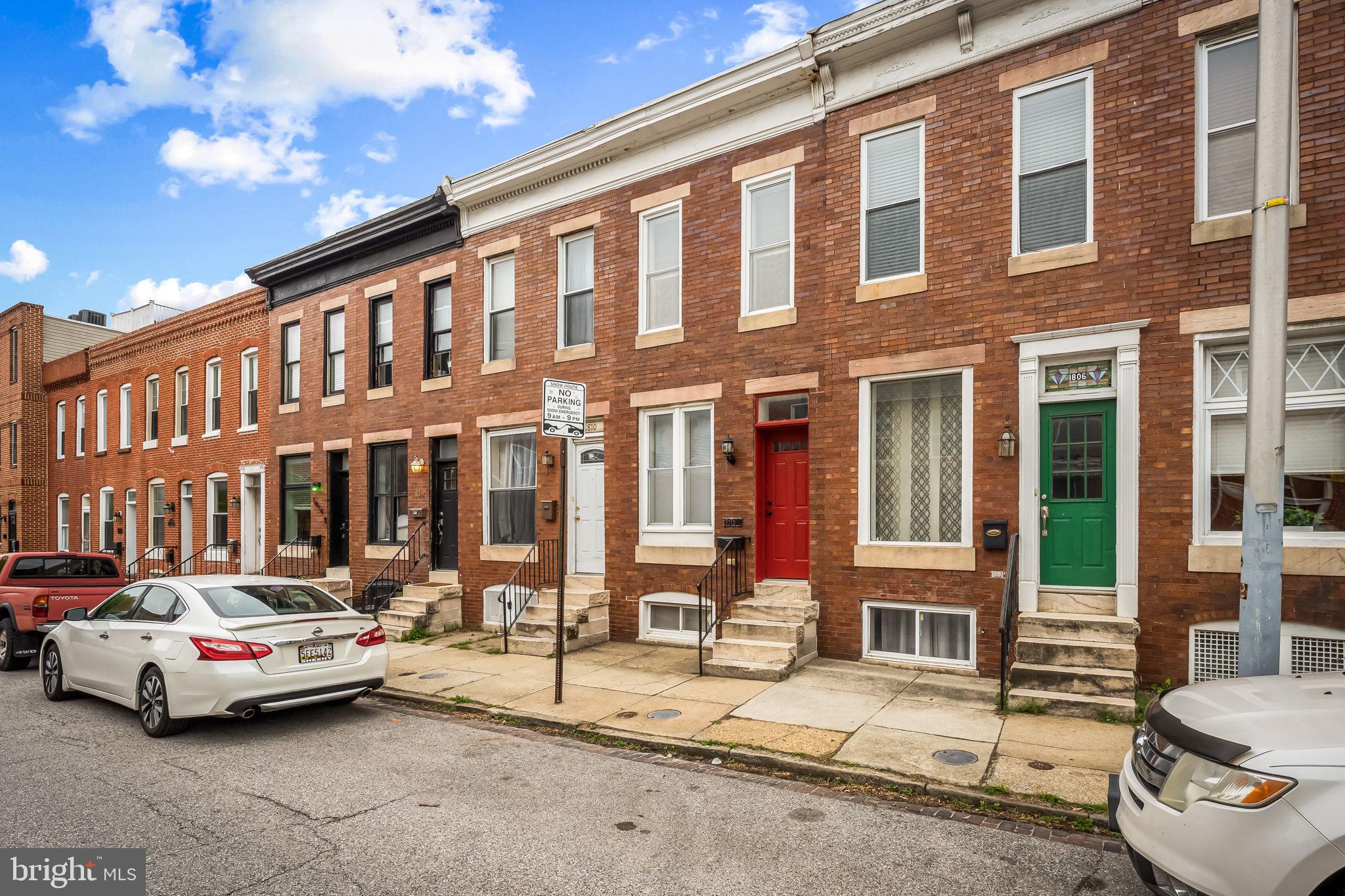 Rare 2 car parking! That alone makes this one worth a look. 1808 Light St delivers the space, character, and location you will love. Wood floors, exposed brick walls, and a layout that feels open, comfortable, and easy to live in. The main level offers a spacious living room, a convenient half bath, and a kitchen with granite counters, stainless appliances, plenty of cabinet space, and room for a table. Step right out back to a fenced patio that leads to a true 2 car parking pad with easy alley access. Upstairs features two spacious bedrooms and two full bathrooms, giving you flexibility for guests, a home  office, or both. Need storage? The unfinished basement has you covered. Location ties it all together. You are an easy walk to everything Federal Hill has to offer including restaurants, shops, and parks, with quick access to I 95 for an easy commute. Homes with this combination of parking, space, and location do not come around often.