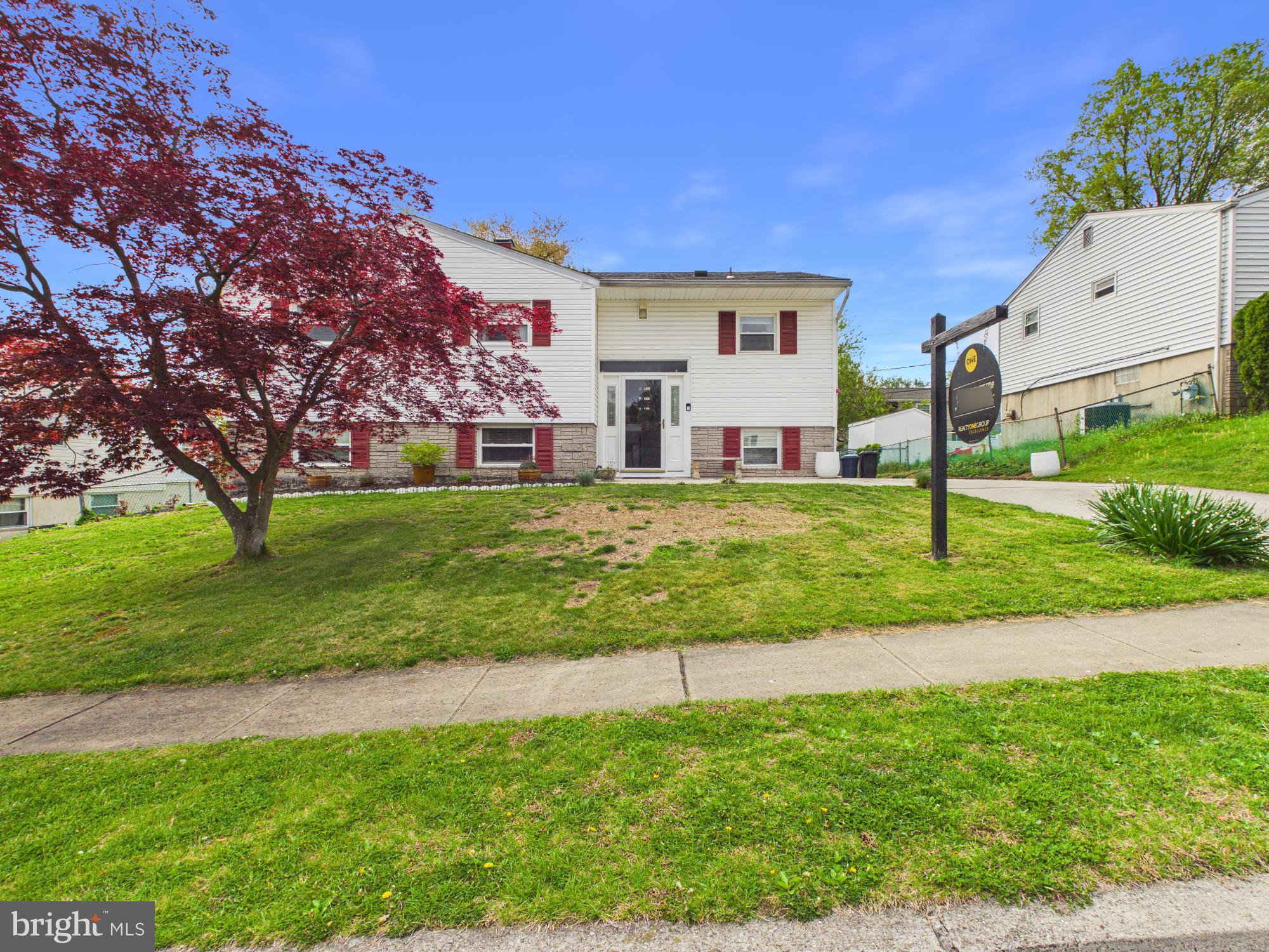 Great opportunity to own a spacious 4-bedroom, 2-full-bath split-level home offering comfort, flexibility, and room to grow. This home is ideal for buyers looking for a layout that can support multi-generational living, an in-law suite, au pair setup, guest quarters, or separate upper/lower-level living options.

The main level features beautiful wood floors, a bright and inviting living space, and a functional layout designed for everyday living. With two full kitchens, this home offers excellent flexibility for extended family, guests, or buyers who desire added convenience and separation of space. The lower level provides additional living areas that could easily serve as a private suite, recreation space, or independent living area.

Enjoy the comfort of a sunroom overlooking the rear yard, a spacious rear porch/deck perfect for relaxing or entertaining, and a well-manicured lawn that adds to the home’s curb appeal. The spacious fenced rear yard offers plenty of room for gatherings, gardening, pets, play, or simply enjoying your own private outdoor retreat.

Additional features include off-street parking, generous living space, two full bathrooms, and a versatile layout that gives the next owner plenty of options. Conveniently located near shopping, dining, commuter routes, schools, parks, and everyday amenities, this home offers the space, function, and flexibility today’s buyers are looking for.
