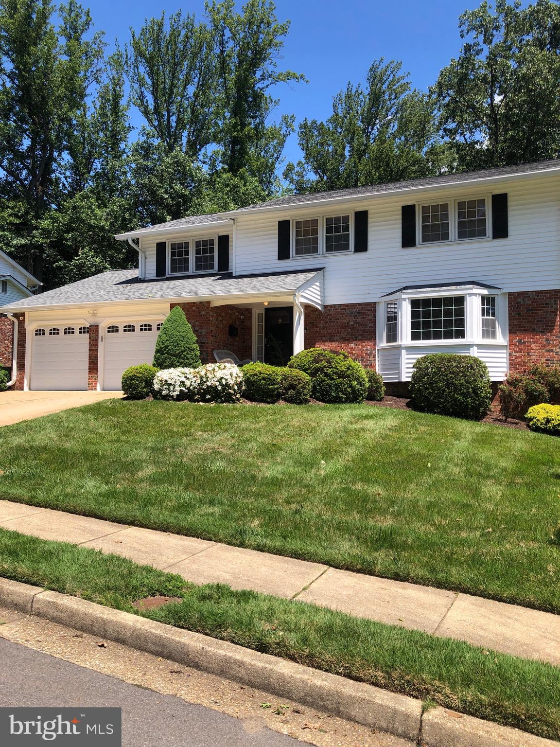 This five bedroom, two full and two half bath home is move in ready. The home is situated on an oversized lot that backs to lake Accotink woods. There is a large level backyard with a built in basketball court great for entertaining or playing. There are newly refinished hardwood floors throughout this home. The bright and sunny living room has a huge bay window that lets in lots of natural light. A large family room with a gas fireplace opens out to the spacious deck. The kitchen has double wall ovens, built-in microwave, a cooktop, dishwasher  and refrigerator all stainless steel.  The floor to ceiling kitchen windows face out to the woods behind the property. There is a nice breakfast bar on the island that also has a wine fridge and a veggie prep sink. The storage in this kitchen is unbelievable with several pantries, an island and plenty of cabinets and granite counter tops. There is a formal dining room with beautiful crown molding , recessed lights and a chandelier.  The upper floor has five bedrooms and two full baths.  The primary suite has its own full bath with separate tub and shower and was just updated with great tile work and a new vanity with dual sinks. There is also a full bath that was also updated with dual sink and a shower tub combo with lovely tile work that serves the other four bedrooms. All the bedrooms are large and roomy with good sized closets. The basement has a rec room. laundry area, half bath as well as additional storage space. An addition was added expanding the kitchen, pantry, dining room and basement footprint giving 3800 sq feet of living space.  The landscaping and curb appeal make it one of the nicest homes in the neighborhood. The backyard deck will be a great place to relax and enjoy the natural wooded surroundings. There is a two car garage and additional parking in the driveway. Close to shopping, restaurants, community pool and the VRE. Don't miss this opportunity to own a great home in a great neighborhood.