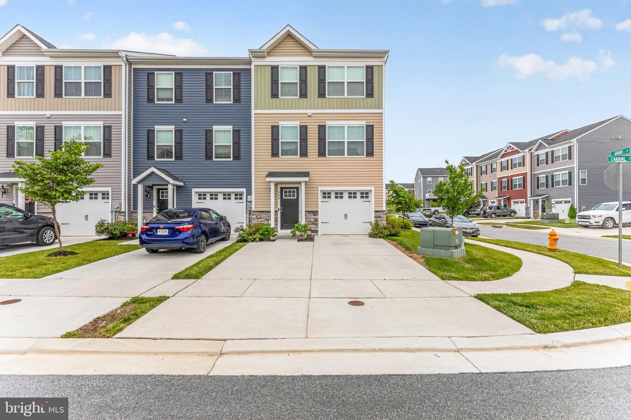 Discover the charm of this beautifully maintained end-of-row townhouse in the desirable Meade's Crossing community. Built in 2021, this Colonial-style home offers a perfect blend of modern comfort and inviting warmth, making it an ideal retreat for anyone seeking a place to call home. With 1,680 square feet of thoughtfully designed living space, this residence features three spacious bedrooms and two and a half bathrooms, providing ample room for relaxation and privacy. The fully finished basement offers endless possibilities-whether you envision a cozy family room, a home office, or a play area, the choice is yours! Step outside to enjoy the community's fantastic amenities, including a sparkling swimming pool, fitness center, and volleyball courts, perfect for active lifestyles. Take leisurely strolls along the jog/walk path or unwind at the community center, fostering a sense of connection with neighbors. The attached garage ensures convenience and security, while the low-maintenance vinyl siding and stone exterior add to the home's curb appeal.  This home is not just a property; it's a lifestyle. Schedule your private tour today and experience the warmth and comfort that awaits you!