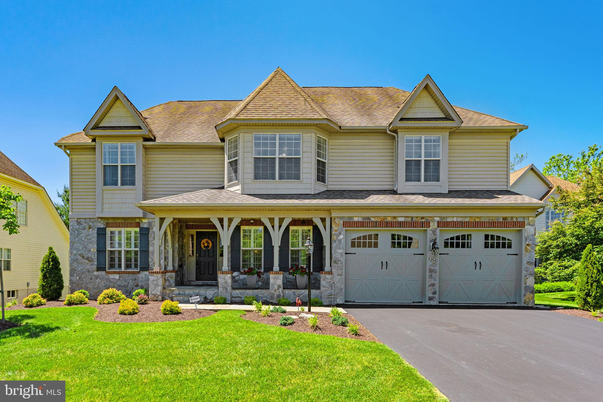 Tucked away on a cul-de-sac in the prestigious gated community of Beallair, this beautiful stone-front Colonial enjoys one of the most coveted locations in the community, backing to both the walking trail and a tranquil creek for a rare blend of privacy, natural beauty, and serene wooded views.

Built in 2005, the home offers 5 bedrooms, 2.5 baths, a 2-car garage, and a bright, open layout filled with natural light. Cathedral ceilings, crown molding, hardwood flooring, marble shower, ceramic floors, plantation shutters, and a propane fireplace add warmth and character throughout.

True main-level living, increasingly hard to find, sets this home apart, with the primary suite and laundry both conveniently on the main floor. The gourmet kitchen is designed for function and entertaining, featuring granite countertops, custom cabinetry, stainless steel appliances, a propane cooktop, double wall oven, and plenty of room to gather. Upstairs, a loft overlooks the main living area, and two bedrooms feature charming bay windows.

The mostly unfinished basement offers excellent potential and already includes a finished bedroom with luxury vinyl plank flooring, recessed lighting and a rough-in for an additional bath. Outside, a spacious Trex deck and screened porch with a ceiling fan are perfect for relaxing or entertaining while taking in the peaceful sights and sounds of the creek and woods beyond.

Life in Beallair is truly special. Set on land once part of a historic George Washington family plantation, this master-planned community is one of the most amenity-rich in Jefferson County, offering a stately manor house, walking trails, parkland, a gazebo park, historic gardens, and a brand-new clubhouse with pool and fitness facilities under construction. Best of all, the HOA handles lawn mowing and sidewalk snow removal, leaving your weekends free to enjoy the trails, the creek, and the screened porch. It's the perfect blend of upscale living, rich history, and effortless convenience, just minutes the small-town charm of historic Charles Town, while also being centrally located to commuter routes.