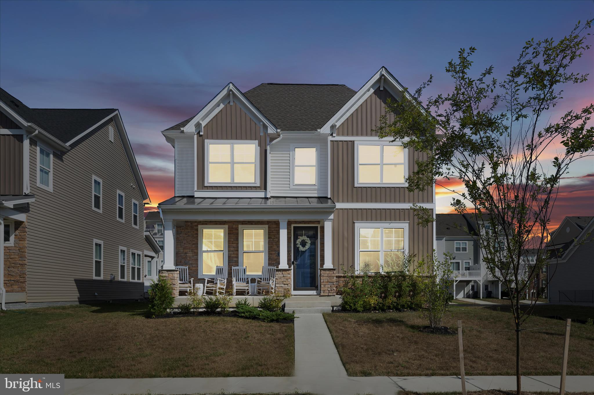 This stunning residence shows like a model home and offers the rare advantage of being better than new. Situated within walking distance to the community center, pool, and playground in the amenity-rich Stonehaven community, this two-year-old home was freshly painted just last year and is loaded with luxury upgrades throughout. Spanning over 4,000 square feet, the expansive floor plan features five bedrooms and four and a half baths, providing ample space for living and entertaining. Upon entry, a light-filled foyer flows into an elegant formal living room and a large dining room designed for hosting. The main level is further enhanced by a half bath with a pedestal sink and gorgeous new tile flooring.

The heart of the home is an open-concept family room with a gas fireplace that connects seamlessly to a gourmet kitchen. This chef’s space is equipped with a large eat-in island, granite countertops, stainless steel appliances, under-cabinet lighting, and new pendant fixtures. Adjacent to the kitchen, a bright breakfast area features decorative wall molding and leads to a mudroom providing access to the two-car garage—complete with epoxy flooring—and a fully fenced backyard.

The upper level is defined by an enormous primary suite accessed through French doors, featuring a tray ceiling, a private sitting area, and rich hardwood flooring. The suite’s massive walk-in closet includes custom built-in shelving and a new chandelier, while the primary bath offers a double vanity, a walk-in tiled shower with a bench, and a large linen closet. A secondary primary suite with its own private full bath provides excellent flexibility, while two additional large bedrooms with walk-in closets share a well-appointed hall bath with a double vanity. A convenient laundry room completes this level.

The fully finished walk-out basement is a true standout, featuring a custom-built bar with granite countertops and a wet bar with adjustable lighting installed only three months ago. This level also includes a fifth bedroom, a full bath, an enclosed office with glass doors and hardwood floors, and a utility room perfect for a home gym or extra storage. Modern comforts abound, including a tankless hot water heater, a full sprinkler system, recessed lighting, crown molding, and upgraded matching light fixtures throughout. Perfectly located near premier shopping, dining, and commuter routes, this home offers a unique opportunity to own a turnkey masterpiece at an exceptional value. Book your showing today.