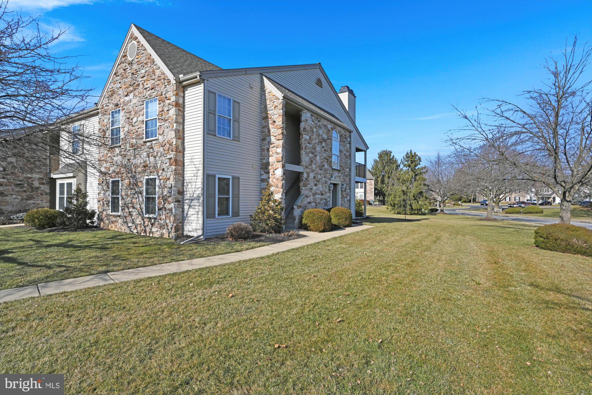 Well cared for 2nd floor end unit in quiet and convenient Greenview Terrace! Interior features a tiled foyer, spacious living room with fireplace, adjoining dining area, and an eat in kitchen. Primary bedroom with private bath and walk in closet. There are two additional bedrooms, a 2nd full bath and a laundry/utility room. Exterior features a relaxing covered deck off of the living room, and a small utility room for extra storage.  All appliances are included. New heat pump in 2021! One assigned parking space with plenty of overflow parking. Monthly $264 HOA fee includes water, sewer, trash, snow & mow, common area & exterior maintenance. EZ to show - quick possession possible!