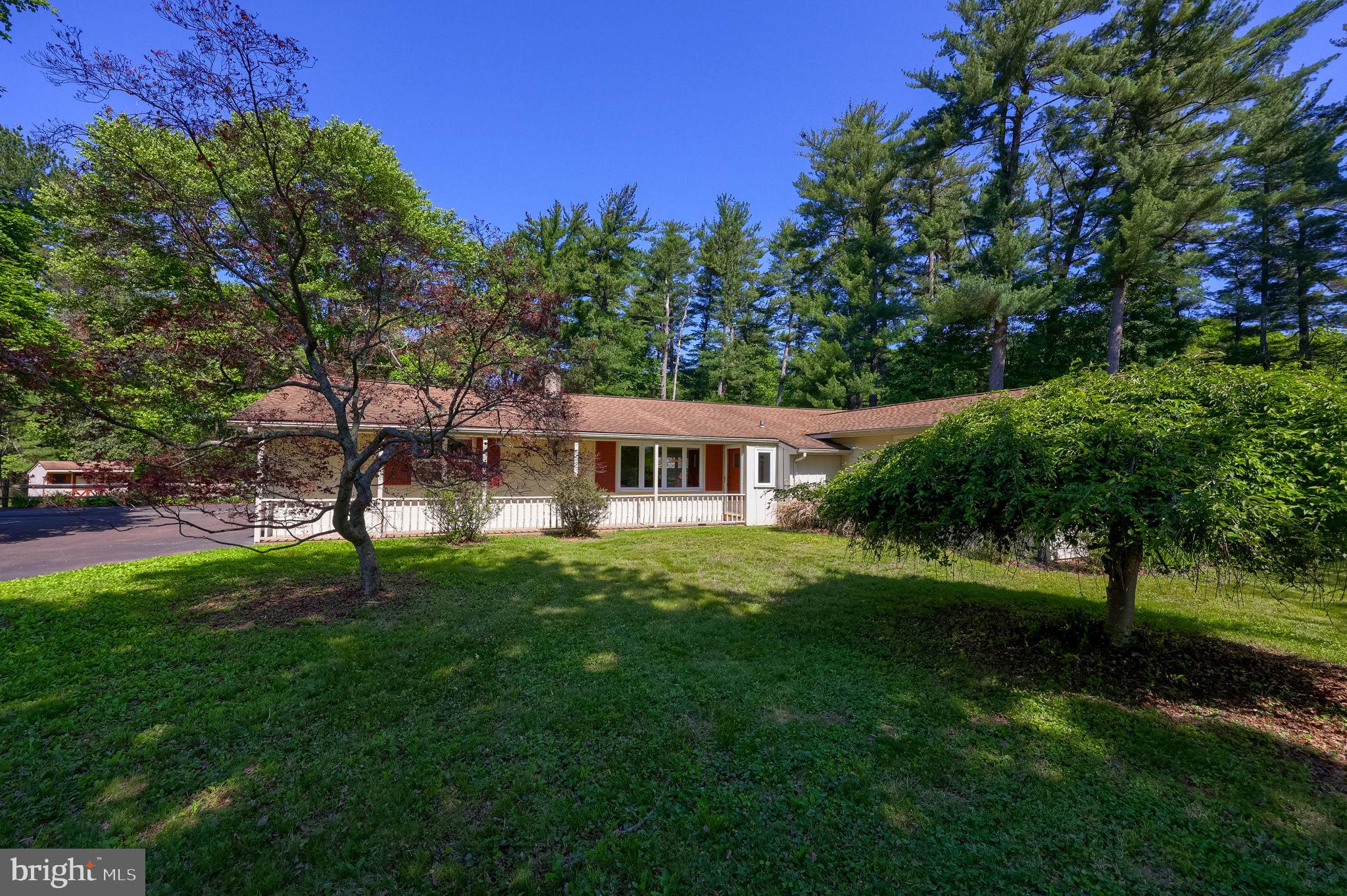 BACK ON THE MARKET!!!!! (LOCATION, LOCATION, LOCATION)

Enjoy the quiet privacy of this custom-built, well-maintained ranch, offering comfortable one-floor living and a warm, welcoming feeling from the moment you step inside. 
 Built in 1964 with (2) spacious additions in the 1980's, the home features a vaulted sunroom/family room with a newer wood burning stove and a bright primary bedroom with its own en-suite bathroom.  Hardwood floors run throughout, and the living room’s bay window fills the space with natural light. Enter through the heated two car garage, a great bonus in colder months. A large finished lower level with an open layout and bar adds even more space for entertaining, relaxing, or creating your ideal recreation area.
The home sits on 1.0-acre, with an additional 2.75 acres included as part of the main deed, for a total of 3.75 acres. Per the township, the 2.75-acre portion may be separated with approval if desired, offering flexibility and future potential.
 KEY FEATURES: Newer A/C compressor (approx. 3 years old), hardwood floors throughout, central vacuum, Corian Countertops in the kitchen, main floor washer and dryer, plenty of storage, beautiful park like setting, vaulted family room, newer wood burning stove, heated two car garage, finished lower level with open layout and bar, primary suite with en-suite bath, bay window living room, and 3.75 total acres with township approved potential to separate the 2.75 acre portion.
A TRULY INVITING PROPERTY — A MUST SEE to fully appreciate everything it offers.
The property will be sold as "We will not repair anything". The Room Sizes are approximate.  This is part of an Estate Sale. An inspection was done of the Septic System.  It will need a new system in the future.  The price was dropped to accomodate the cost of this.
(Back on the Market -Buyer's Financing Fell through)