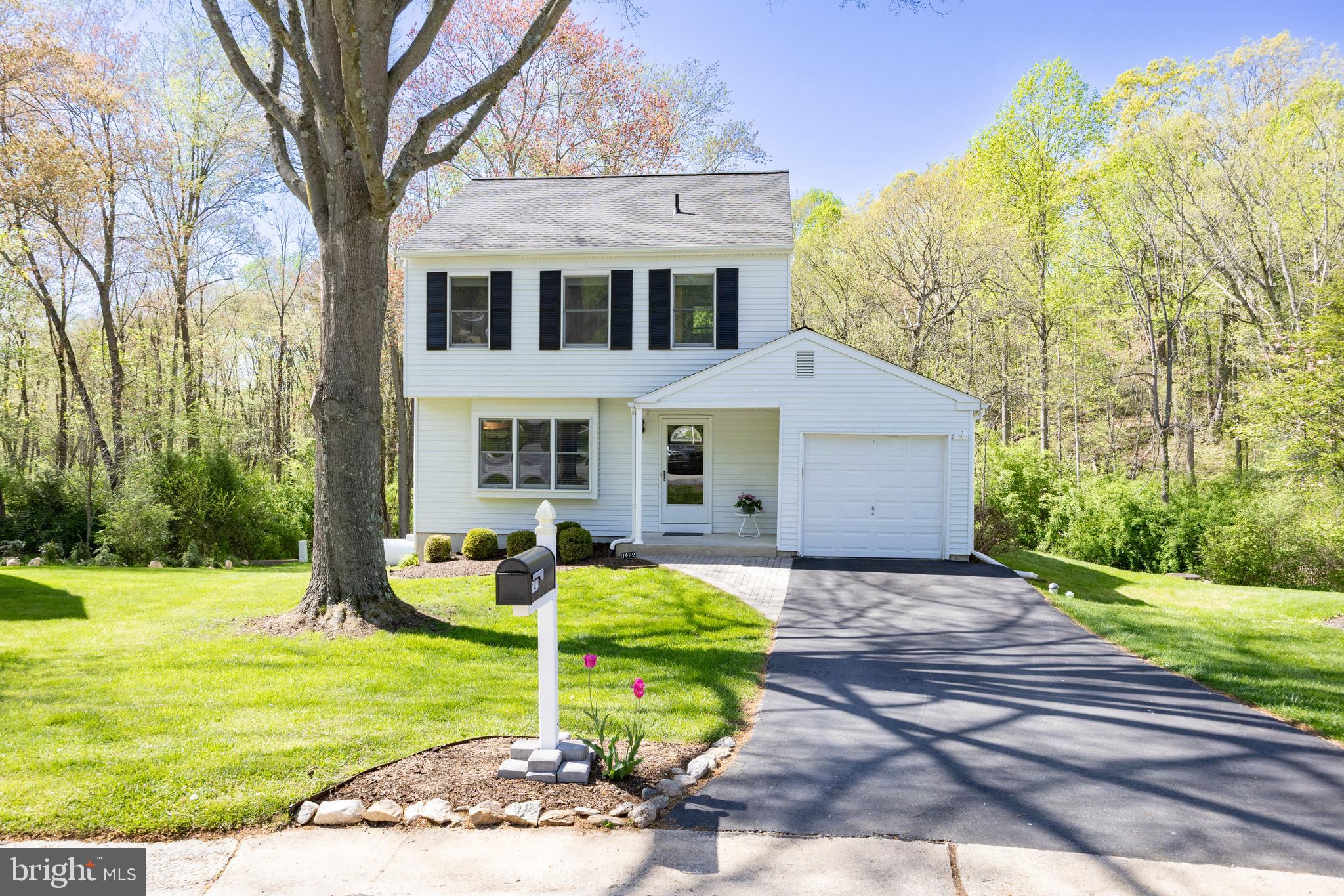 Welcome to one of the premier lots in Victoria Crossing! Tucked away at the end of a peaceful cul-de-sac, this 3-bedroom, 2.5-bath two-story home overlooks a tranquil stream and wooded backdrop, creating a picturesque setting. Step inside to a comfortable floorplan featuring a living room with brand-new carpeting and a beautifully updated custom kitchen complete with 42" wood cabinetry that extends to the ceiling, under cabinet lighting, Corian countertops, a tiled backsplash, and countertop seating. The adjacent dining area features a built-in desk unit and opens to a spacious family room addition with gas fireplace, ceiling fan, storage closet, and triple windows that bring in serene views of nature. A sliding glass door leads to the composite deck with vinyl railings, privacy panel, and stairs to the fabulous backyard—ideal for entertaining or relaxing in peaceful seclusion. The main level also includes an updated powder room with Corian vanity,  laundry room with cabinets, and access to the garage. Upstairs, you'll find a primary bedroom, en suite bath with updated shower, along with two additional bedrooms sharing a full hall bath with Bathfitter tub surround. All three bedrooms feature brand-new carpeting and ceiling fans for comfort. This home offers two basements: one finished space under the addition with radiant heat, a gas stove with blower and thermostat, storage closet, windows providing serene views, and sliding glass door to a private patio. This room is ideal for a home office, gym, or additional living area. The second basement is accessed off the kitchen and provides ample storage space and another sliding glass door to the patio. This home went through an independent energy audit and energy saving features were added. Additional updates include propane hvac system (2018), 500 gallon propane tank (owned), roof (2022), gas hot water heater (2019), 3 sliding glass doors, and deck. This popular neighborhood is within the Downingtown School District with STEM Academy and is conveniently located near United Sports Complex, Broad Run Park, Rt. 30 By-Pass, and train station. This home has been well-maintained and is truly a pleasure to show.