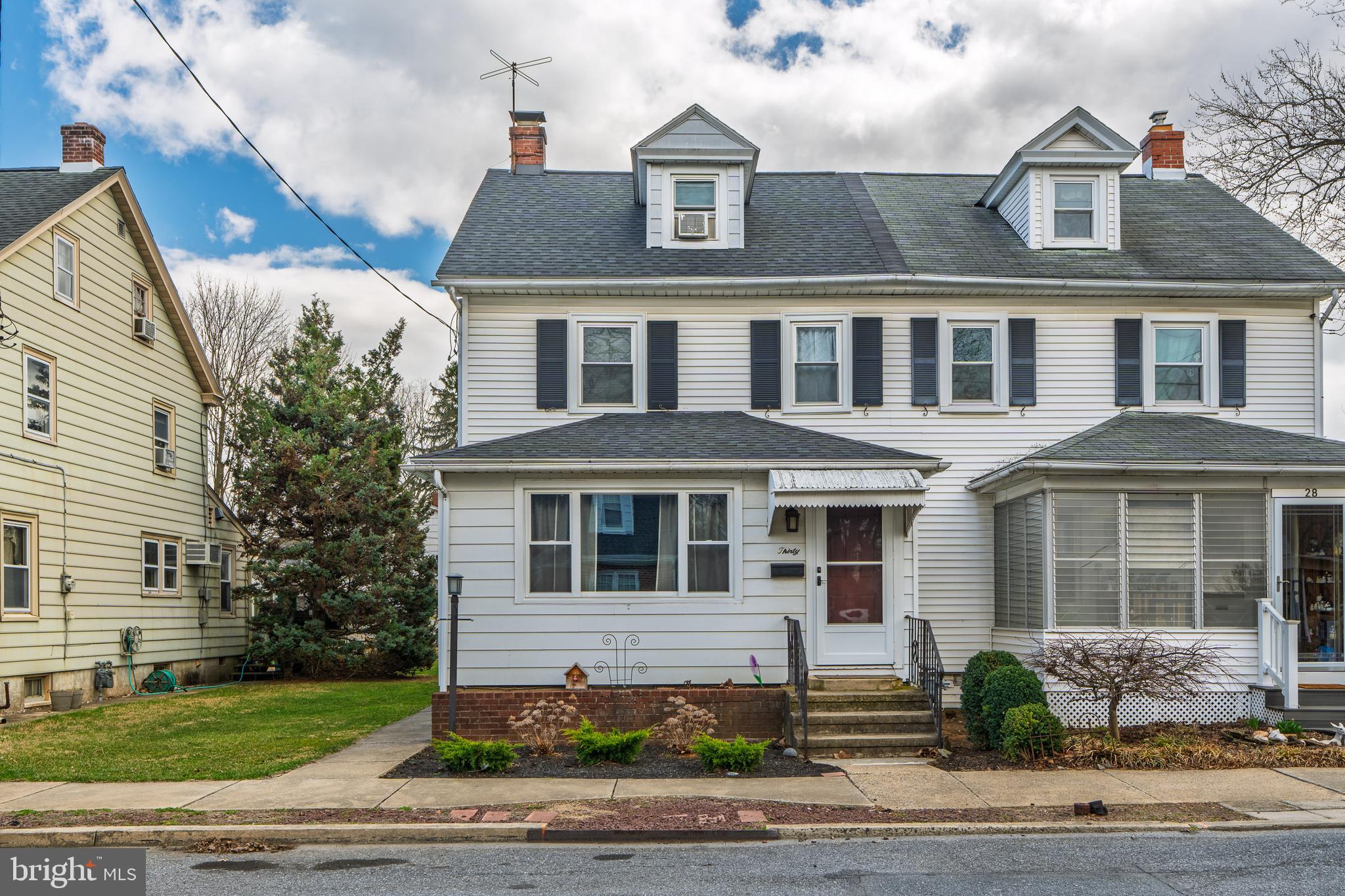 Hard to find in Lititz these days! A lovely home under $300,000 within walking distance to everything downtown Lititz has to offer, and it's even on the sought-after Market Street! Add in new replacement windows, hardwood floors, new front and back doors and a detached two-car garage with new door/opener and this property gets even sweeter. Three nice-sized bedrooms, 1.5 baths and a spacious living room add to the value. New roof and boiler, too. Move right into this home! The works been done! Get ready to enjoy summer time in the heart of historic Lititz!