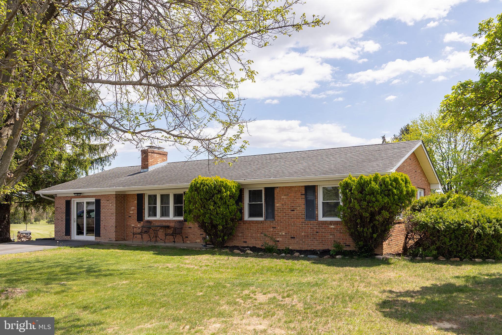 Traditional all brick rancher on nearly an acre with great views of the blue ridge mountains off your back steps.  Showing your age has its upside with original hardwood floors, quaint kitchen, spacious bedrooms, and living rooms that can fit those large furniture pieces.  Wood stoves can heat during those winter months, finished basement with rec room and plenty of storage.  Make sure you check out the oversized shed/garage that has electric.  A little piece of paradise near all the conveniences Stephens City has to offer.