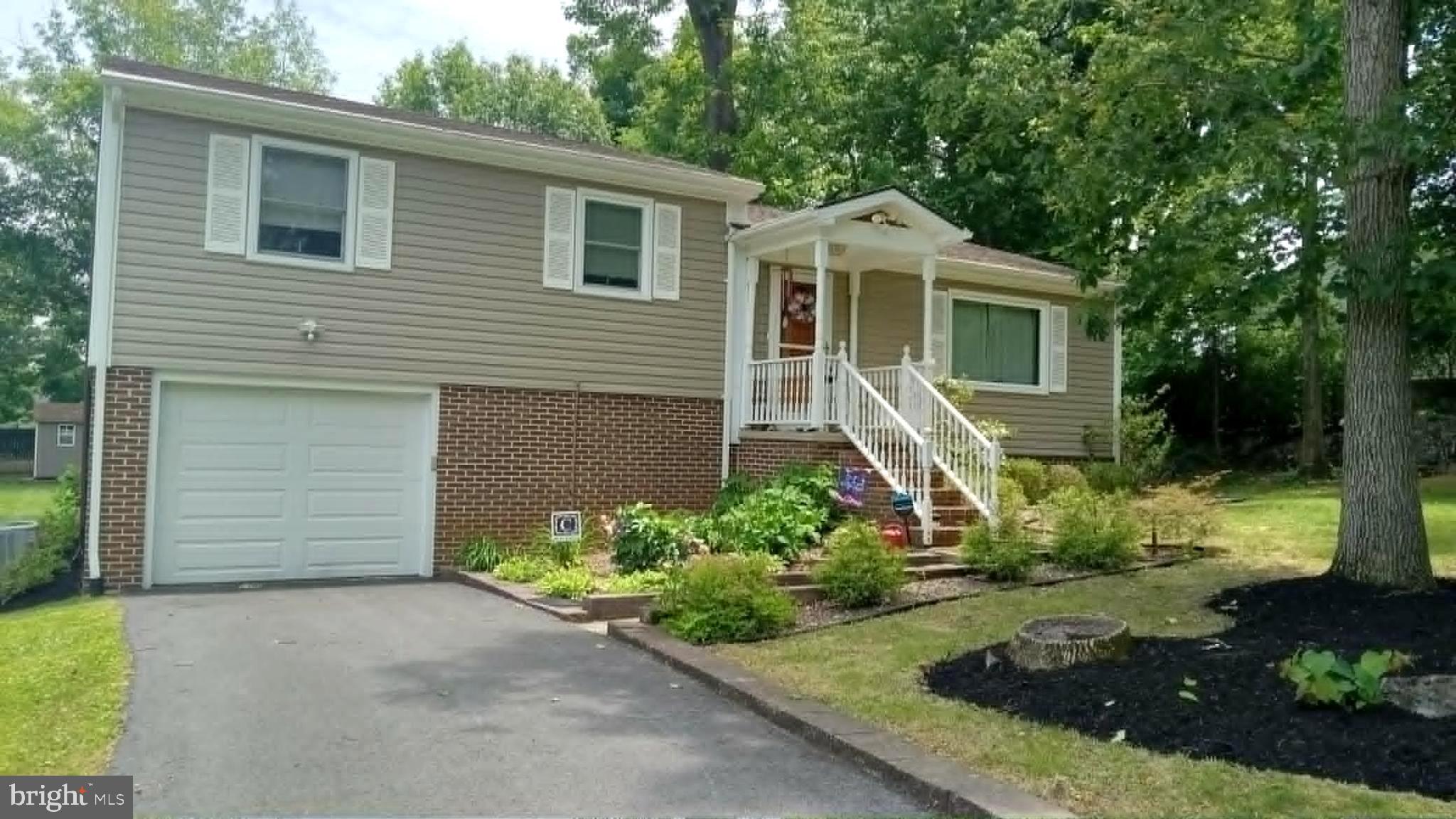 Beautiful 3-bedroom, 3-bath home on a half-acre in a private neighborhood in Martinsburg, WV. Gorgeous wood flooring, beautifully upgraded kitchen with granite counter tops and stainless-steel appliances. Exactly what you have been hoping to find. Large deck overlooks the back yard and wooded area. Finished basement apartment with walkout doors. Nice garage with plenty of storage, all on a beautifully treed lot. Upgraded HVAC, roof, siding, and windows! Quick access to I-81.  This dream home is in mint condition and won't be on the market long!