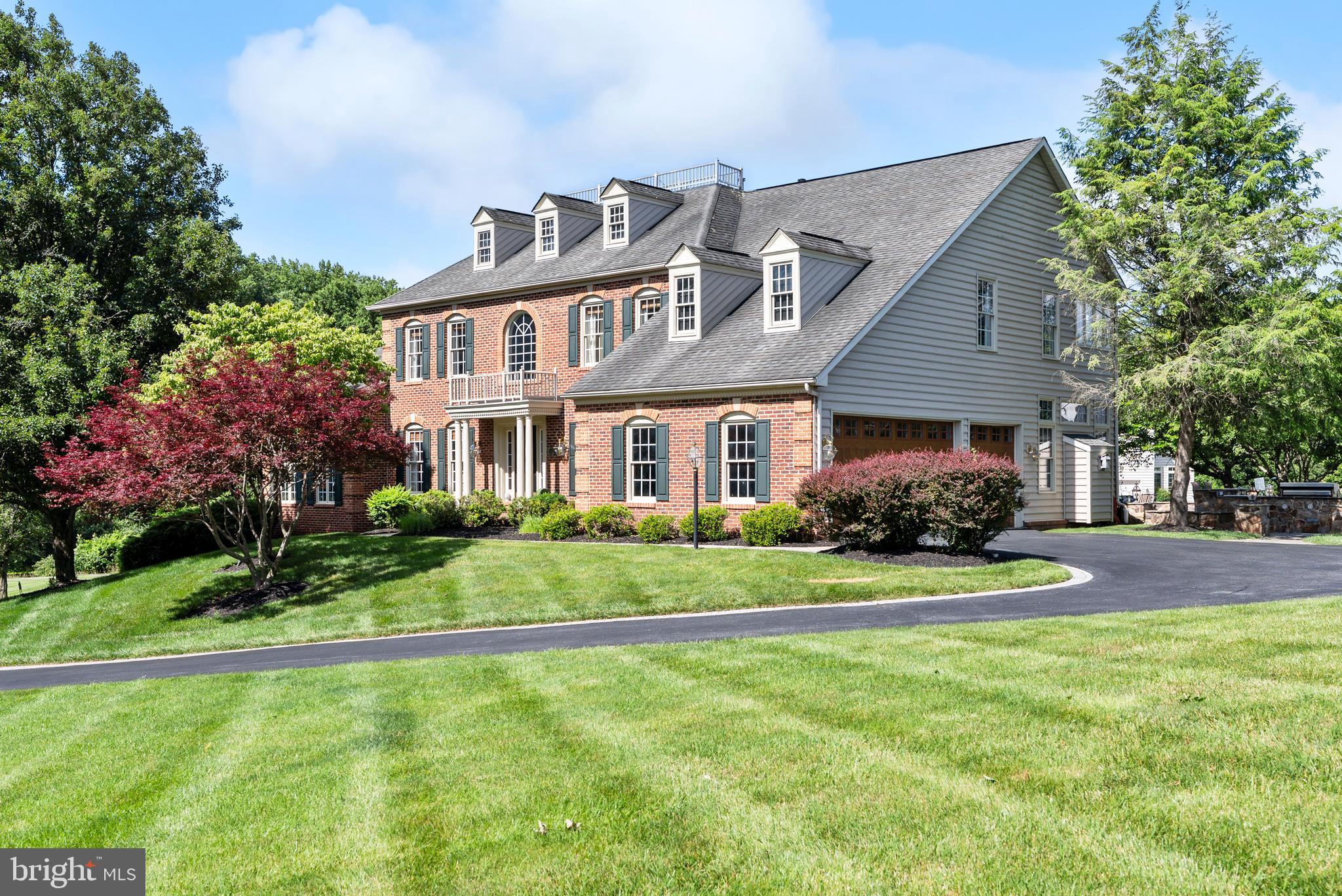 Cherished in Chestnut Woods!   

Offered for the first time, this sophisticated, sun filled, brick Colonial has been meticulously maintained and thoughtfully updated by its original owners since 1999. Tucked away at the end of a cul-de-sac in the highly desirable Chestnut Woods community, this elegant residence offers over 5,000 square feet of beautifully designed living space, blending timeless architecture with modern comforts.

A grand two-story foyer welcomes you into a home filled with natural light, featuring 9-foot ceilings, hardwood flooring, crown molding, and refined designer finishes throughout. The main level offers a private home office, formal living and dining rooms, and a spacious family room anchored by a gas fireplace and French doors leading to the outdoor living area.

The updated gourmet kitchen is both stylish and functional, showcasing granite countertops, stainless steel appliances, a gas cooktop, double wall ovens, and contemporary pendant lighting. Adjacent to the kitchen, the sunlit breakfast room features a wall of windows overlooking the backyard and provides seamless access to the outdoor entertaining spaces.

Designed for gathering and relaxation, the expansive bluestone patio includes a built-in outdoor kitchen, fire pit, and landscape lighting, creating an inviting setting for entertaining throughout the seasons. A bright sunroom with southern exposure offers the perfect retreat to enjoy abundant natural light year-round.

Upstairs, four generously sized bedrooms provide comfortable accommodations. The luxurious primary suite features a spacious sitting area, walk-in closet, and a beautifully renovated spa-inspired bath complete with a freestanding soaking tub and glass-enclosed shower. A second ensuite bedroom and two additional bedrooms connected by a shared bath offer flexibility for family and guests. All upper-level bathrooms have been thoughtfully renovated with timeless finishes, designer lighting, premium fixtures, and integrated smart-home features.

The finished lower level expands the home's versatility with a large recreation room, expertly designed laundry room, full bath, cedar closet, dedicated fitness room, and a bonus room ideally suited for guests, hobbies, or a secondary office.

Please refer to the Owner Features Sheet for a comprehensive list of updates and improvements. First showings begin June 17, 2026.