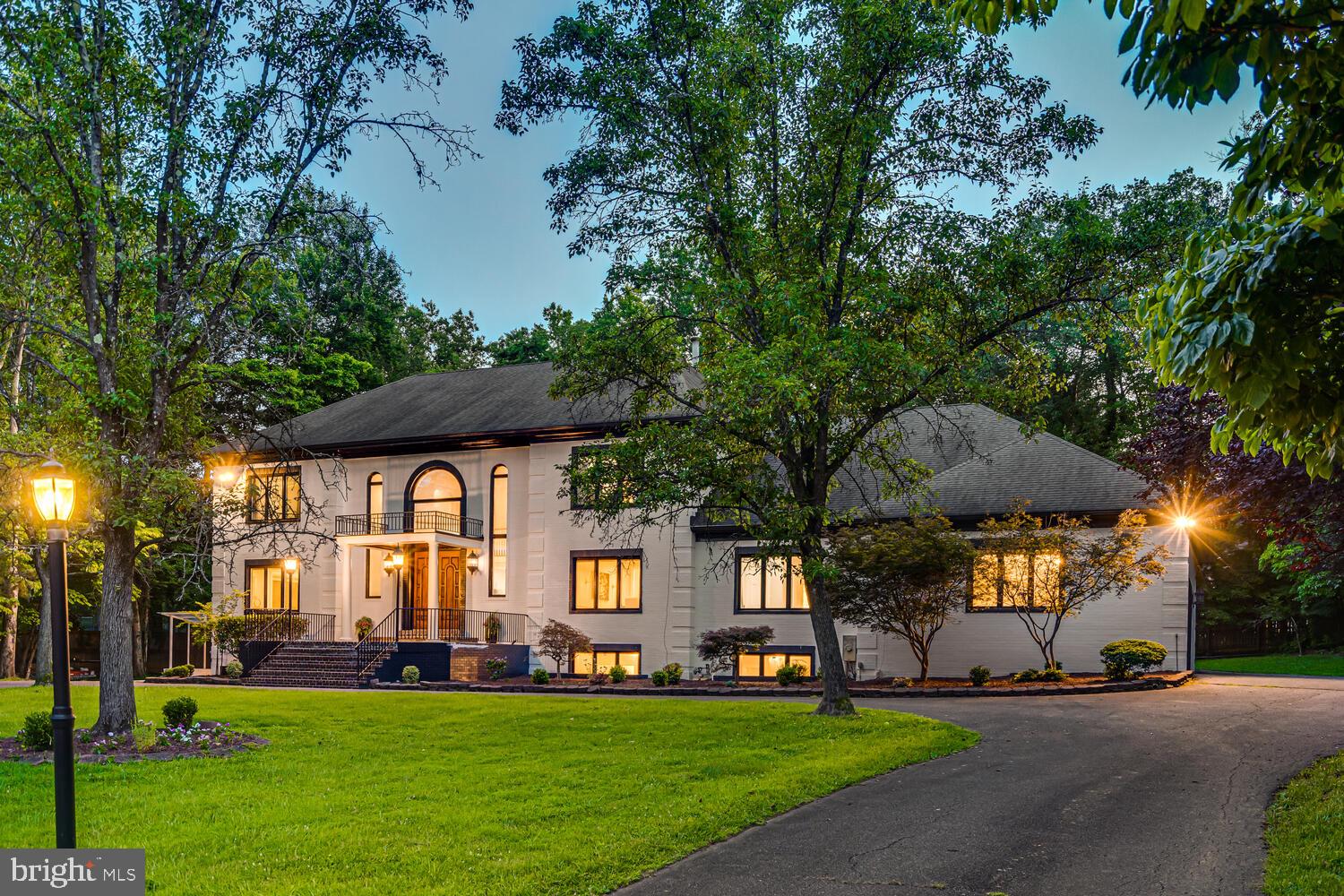 Price perfected! 9118 Bells Mill Road: a modern manor of luxury, perfected. This private 8-bedroom, 7.5 bath estate sits behind a gated drive off Bells Mill Road in the heart of Potomac. A circular motor court and mature landscaping create a discreet, elegant approach to the all-brick residence. Don't miss the video tour!


Inside, a dramatic two-story foyer with dual staircases, marble floors, and a cascading chandelier sets the stage. Formal living and dining rooms lead to a mahogany-clad office, open family room with stone fireplace, and a reimagined gourmet kitchen with oversized island, beverage bar, and top-tier appliances. A main-level guest suite, mudroom, laundry, and 4-car garage add convenience.


Upstairs, the primary retreat offers a fireplace, dressing room, and spa bath with steam shower, sauna, and skylit freestanding tub. Three ensuite bedrooms complete the level. The above-ground lower level includes a great room with fireplace, guest suite, two additional bedrooms/dens, playroom, gym, laundry, and ample storage.


Sited on nearly an acre with a flat, pool-ready backyard, this 8-bedroom estate combines privacy and accessibility—just minutes to top schools, downtown Potomac, and world-class dining.
--

Key Updates: 
Exterior painting (2025), Thermador dishwasher (2025), LG washer and dryer (2025), brick repointing (2025), gazebo (2024), grill gas hookup (2024), primary bedroom closet update (2024), sump pump replacement (2024), primary bathroom and upper level bathrooms all updated (2023), main floor laundry/mudroom update (2023), LG washer and dryer (2023), LVP flooring installed in basement (2022), main and lower level bathrooms updated (2022), hardwood floors refinished (2021), 2-zone HVAC (2020), high-end kitchen appliances (2020), complete kitchen update to create open concept living-dining (2020), surround sound theatre speakers installed in lower level great room surround sound installed (2020), grand foyer update and coat closet built (2020)
