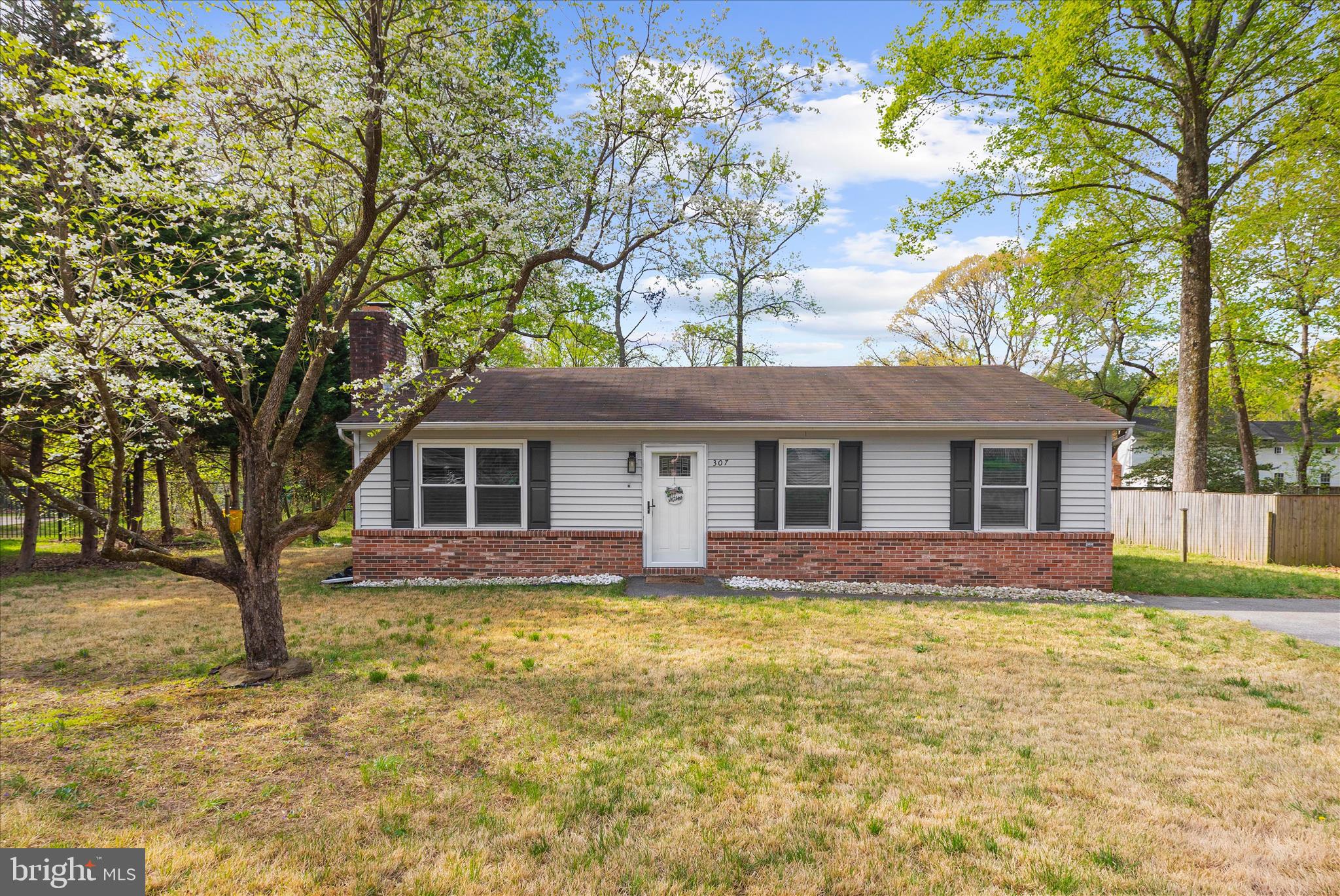 Beautiful 3-bedroom, 2-bath rancher offering easy one-level living in Riverdale Forest. This home features a bright and open living room with vaulted ceilings and a cozy wood-burning fireplace, perfect for relaxing or entertaining. The eat-in kitchen is a standout with white cabinetry, a large peninsula with seating, and plenty of space for everyday dining and gathering. Enjoy outdoor living with a spacious deck overlooking a fully fenced backyard, complete with a storage shed, and set on nearly 1/3 acre. Ample off-street parking for up to 4 vehicles adds everyday convenience. A perfect blend of comfort, space, and functionality!