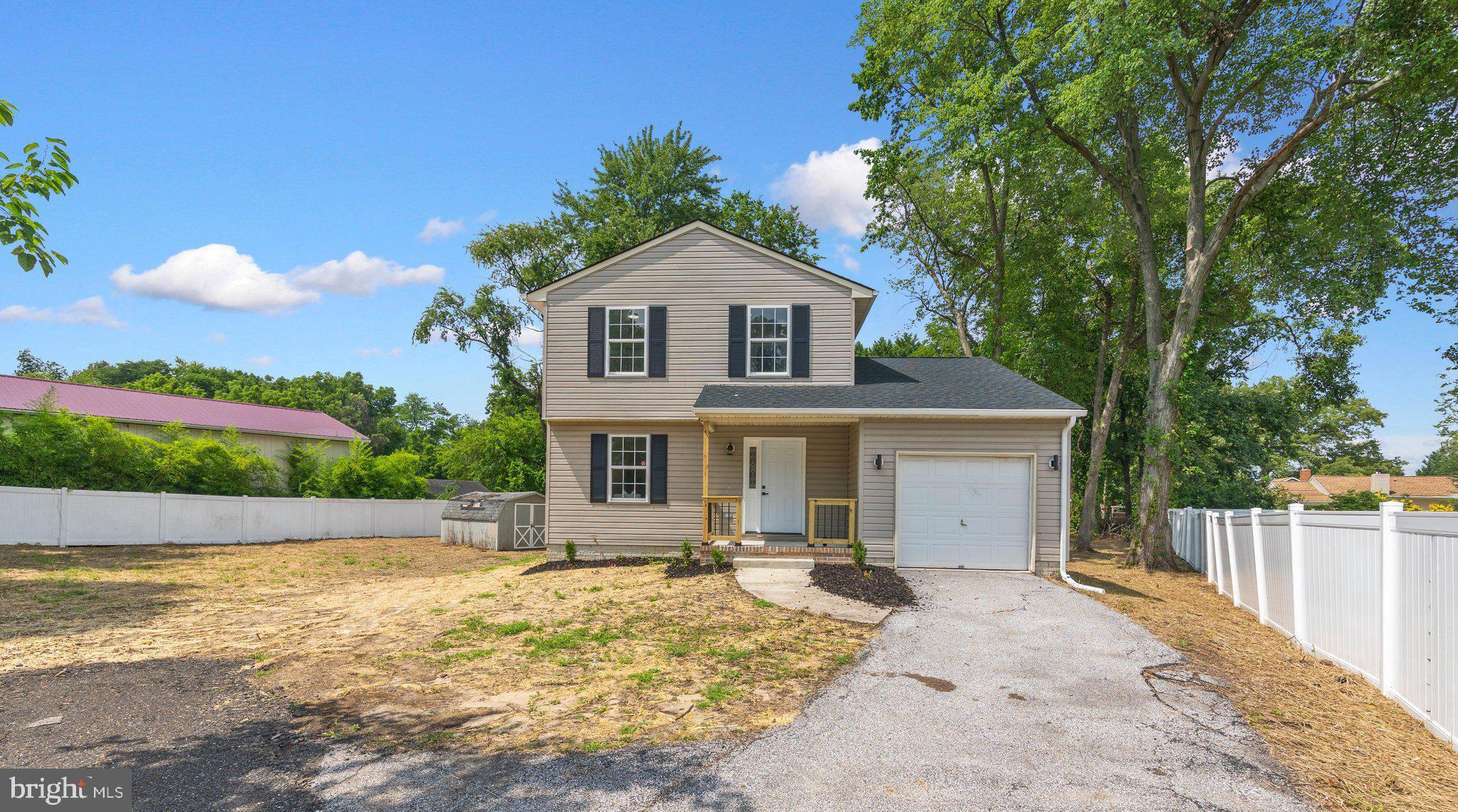 Come see this gorgeous 3 -level Colonial style home, sporting 4-bedrooms, 2 Full and 1/2 bathrooms, in the highly desirable neighborhood of Point Pleasant. The updated interior showcases contemporary finishes and a thoughtful layout that maximizes both style and functionality. Complete with a traditional floor plan and modern finishes that will wow you the minute you walk through the door. The bathrooms have been tastefully refreshed adding modern elegance to this classic home. Freshly painted and new carpet throughout. The custom kitchen with quartz countertops, and stainless-steel appliances offers maximum versatility and functionality. Relax in the spacious living room in front of the electric fireplace, an inviting spot to unwind after a long day The spacious  primary Bedroom has its own full bathroom. the additional bedrooms are across the hall with another refreshed full bath close bye. Keep your auto clean and dry in the oversized single auto attached garage. Enjoy this summer in the large semi fenced 1/3rd acre yard, great for entertaining, grilling, and relaxing. Conveniently located near major routes, restaurants, and entertainment. Schedule to see this amazing clean home today!